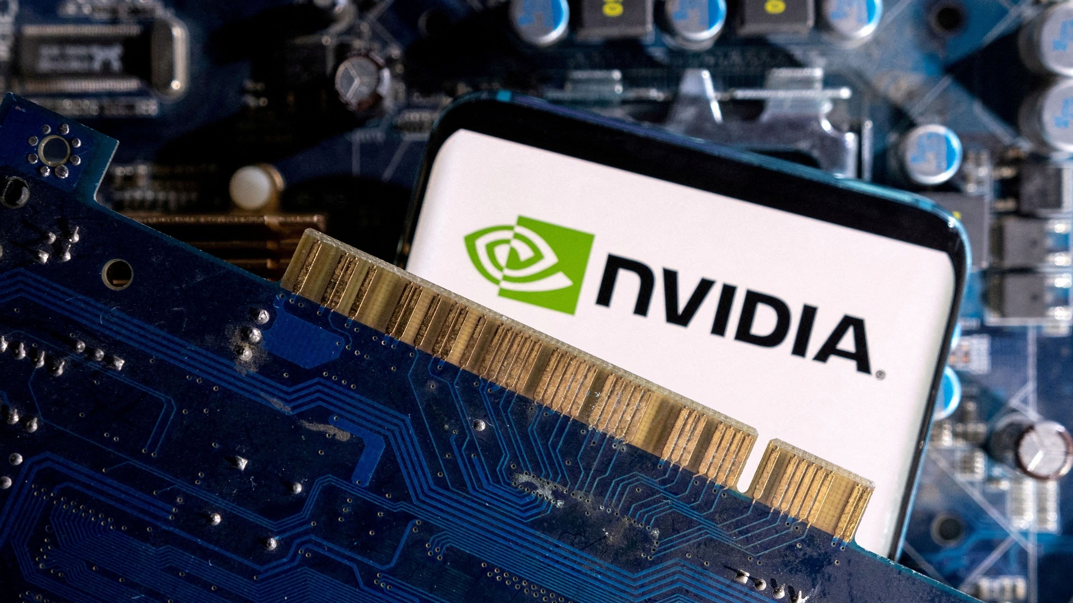 <div class="paragraphs"><p> A smartphone with a displayed NVIDIA logo is placed on a computer motherboard in this illustration taken March 6, 2023.</p></div>