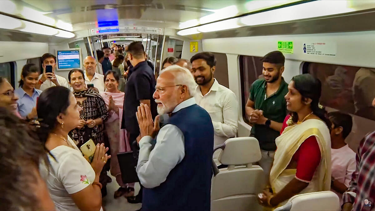 <div class="paragraphs"><p>Prime Minister Narendra Modi travels via metro on his way to inaugurate India International Convention and Expo Centre (IICC), in New Delhi.</p></div>