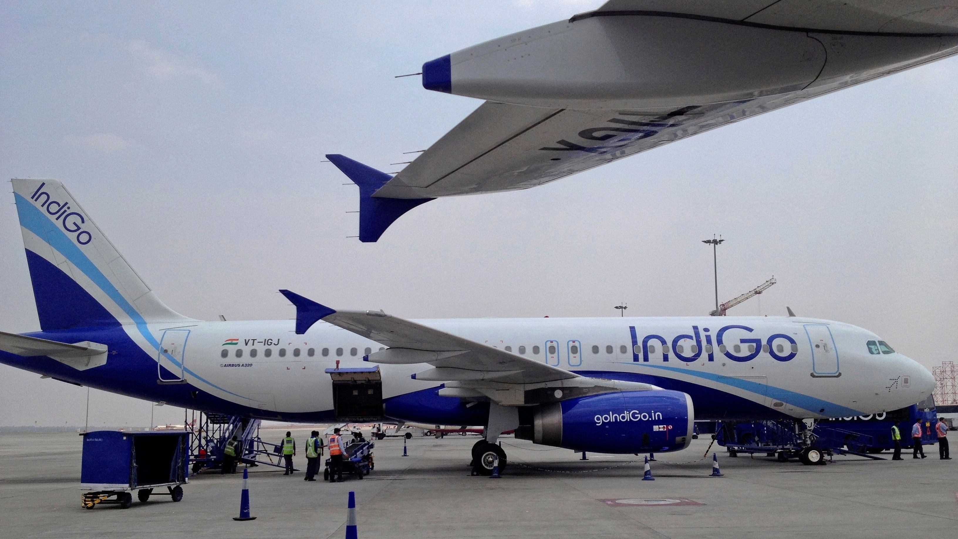 <div class="paragraphs"><p>An IndiGo Airlines A320 aircraft is parked on the tarmac.</p></div>