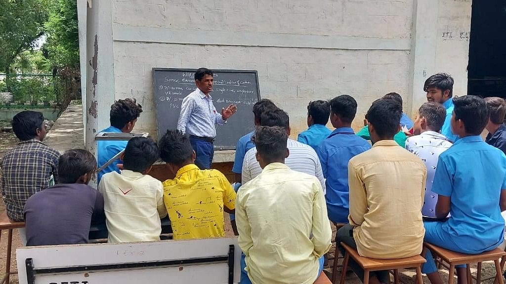 <div class="paragraphs"><p>Students of the government Industrial Training Institute (ITI) at Kanakagiri attend their classes in the open as the institute lacks its own building. </p></div>