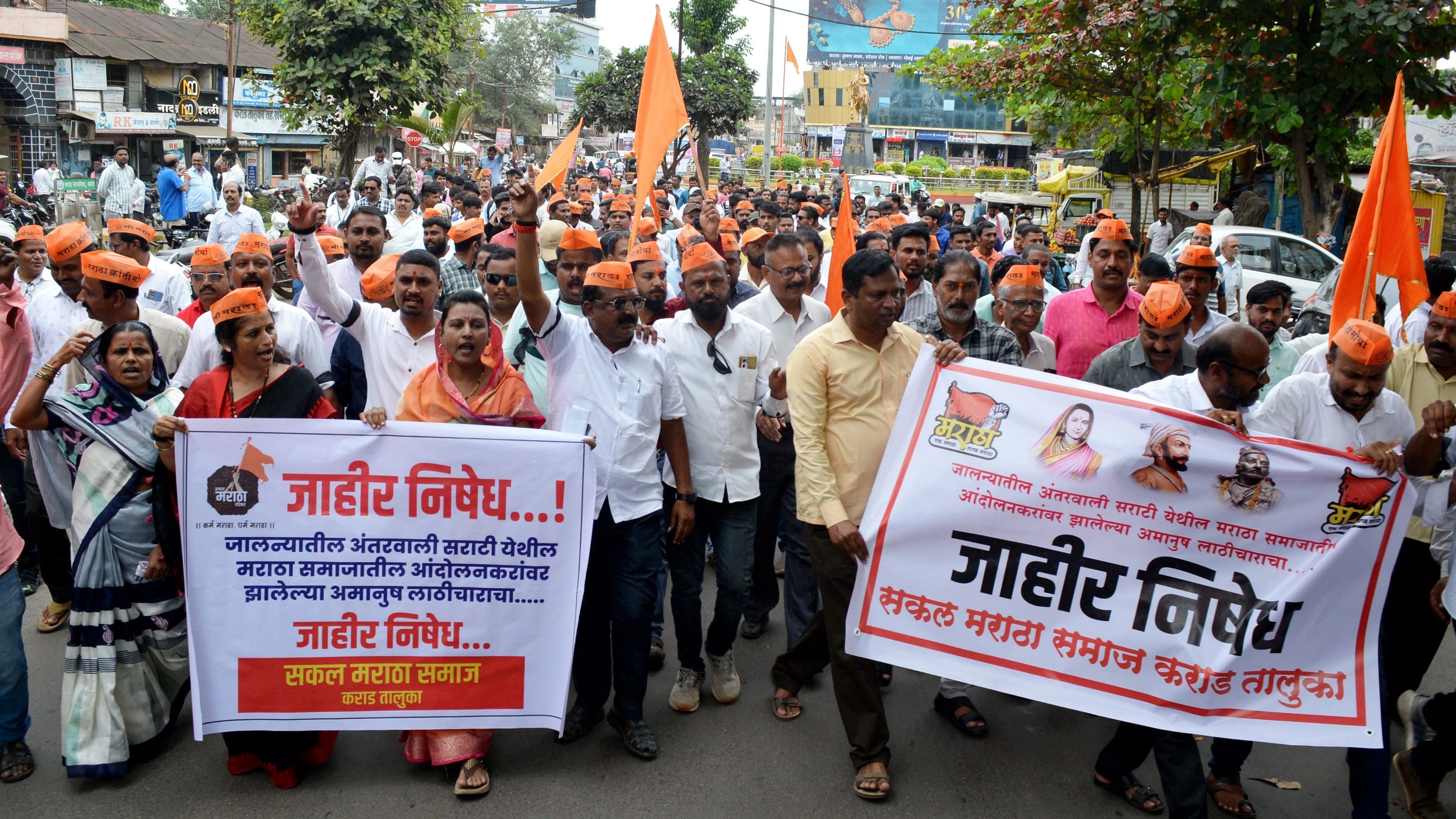 <div class="paragraphs"><p>Maratha Kranti Morcha members stage a protest against Jalna administration over lathicharge on protestors demanding Maratha reservation, in Karad.</p></div>