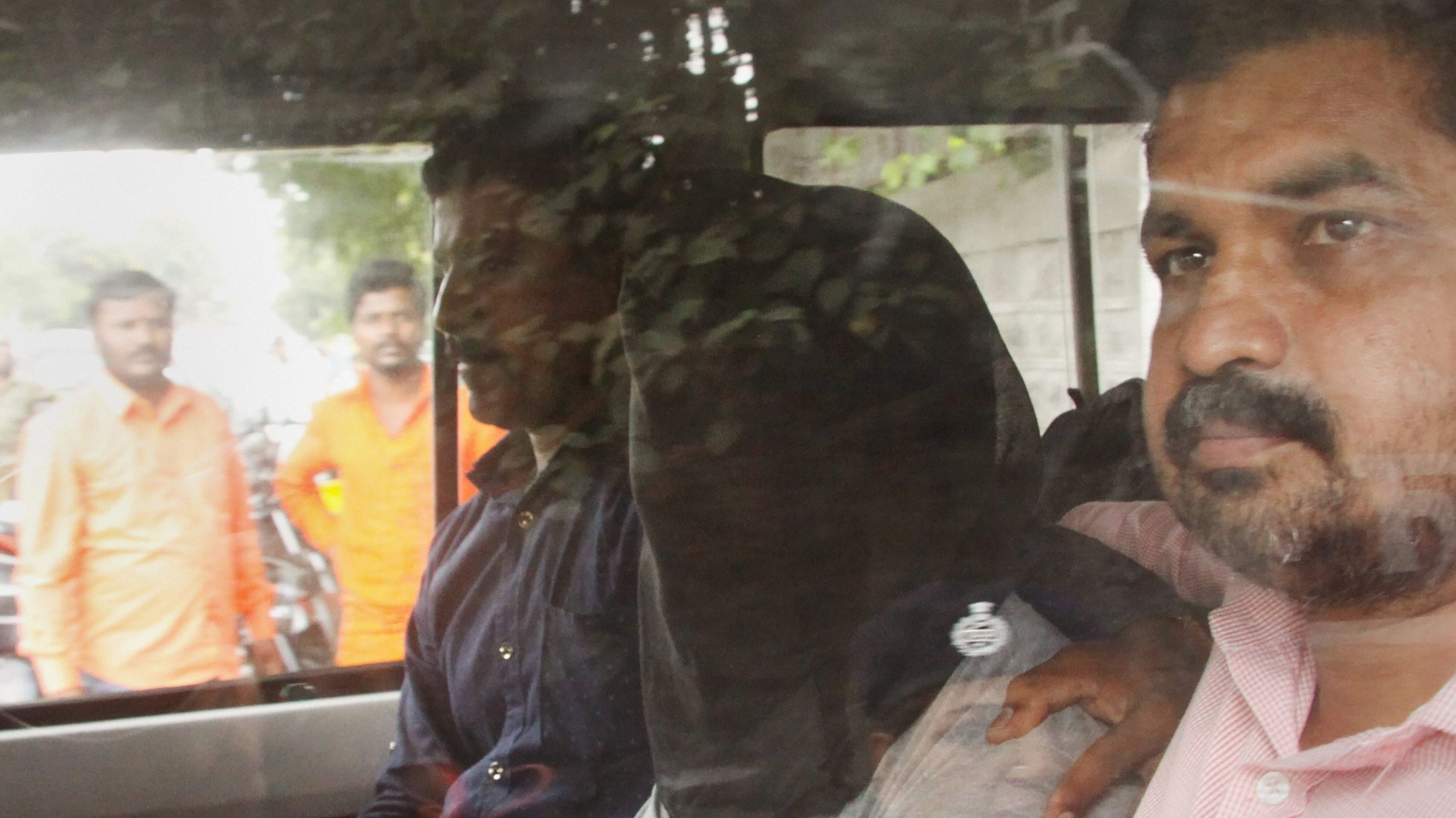 <div class="paragraphs"><p>In this undated file photo, Sharad Kalaskar accussed in rationalist Narendra Dabholkar killing taken to Pune court. A city court on September 04, 2018, granted the custody of arms haul accused Sharad Kalaskar to the CBI for probing his alleged role in the killing of rationalist Narendra Dabholkar.</p></div>