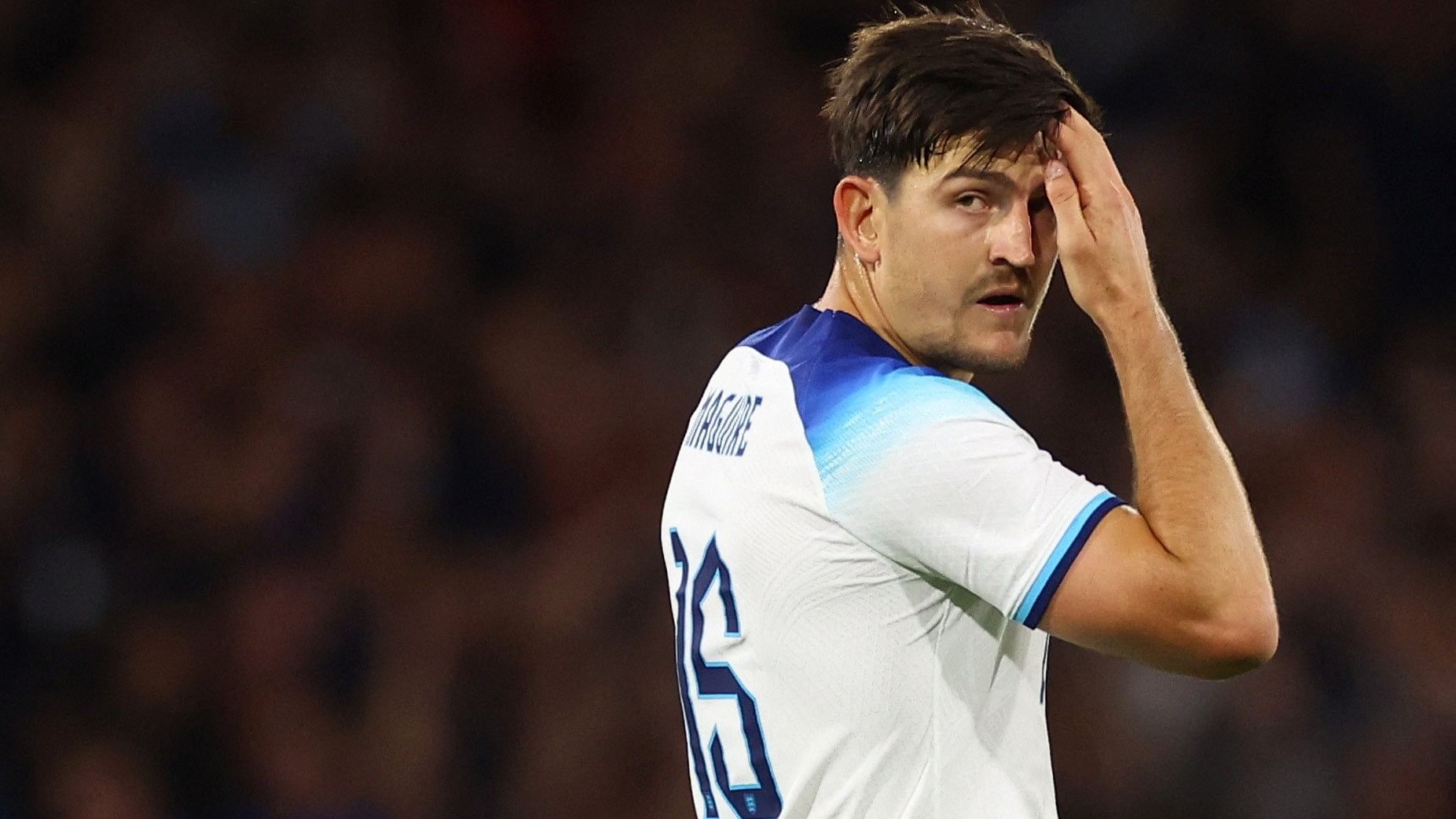 <div class="paragraphs"><p>England's Harry Maguire looks dejected after scoring an own goal and Scotland's first.</p></div>