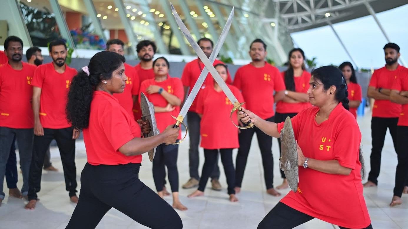 <div class="paragraphs"><p>UST employees undergoing 'Kalaripayattu' training.</p></div>