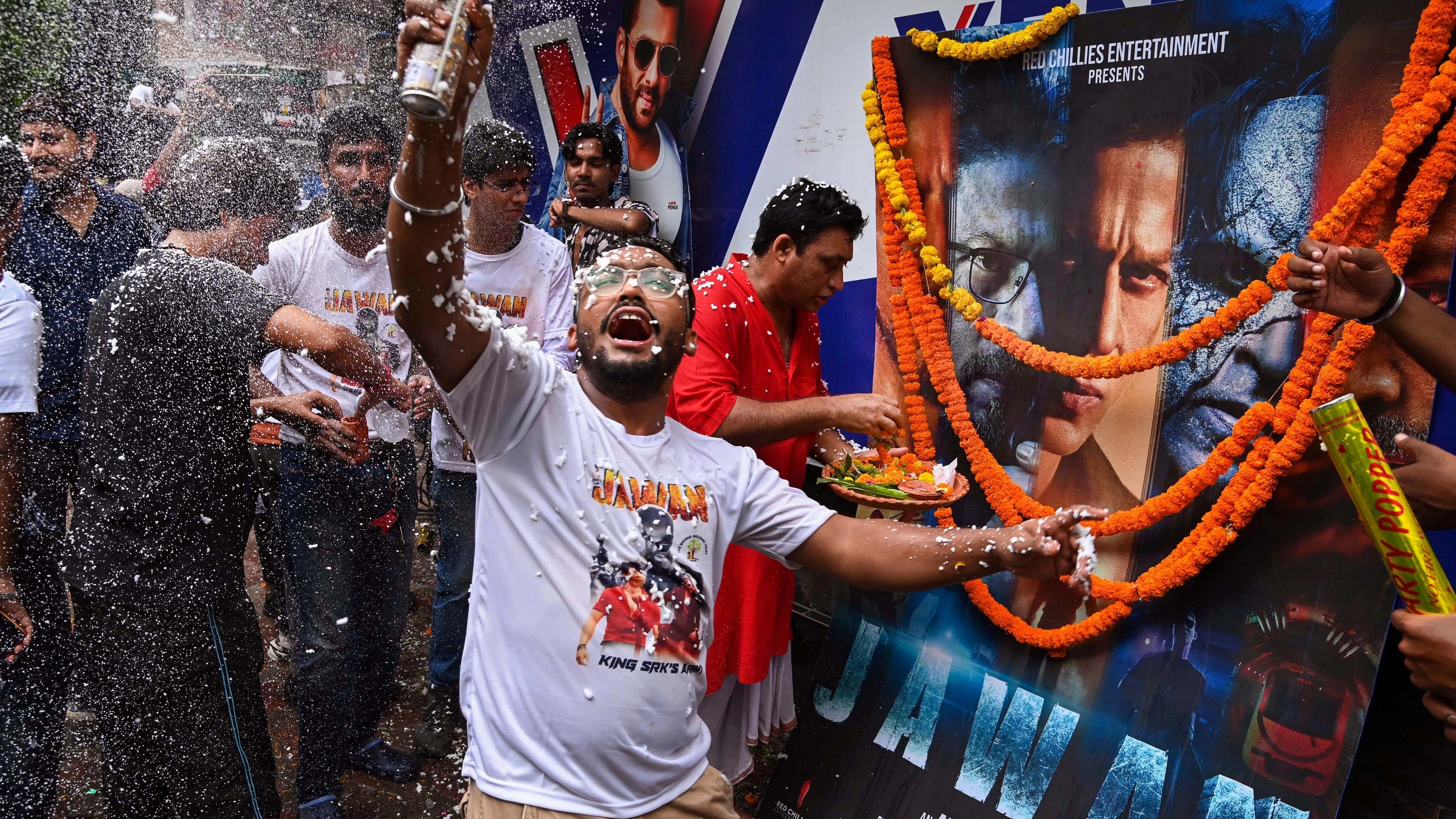 <div class="paragraphs"><p>Fans of actor Shah Rukh Khan celebrate the release of his movie Jawan at a cinema hall, in Kolkata, Thursday, Sept. 7, 2023. </p></div>