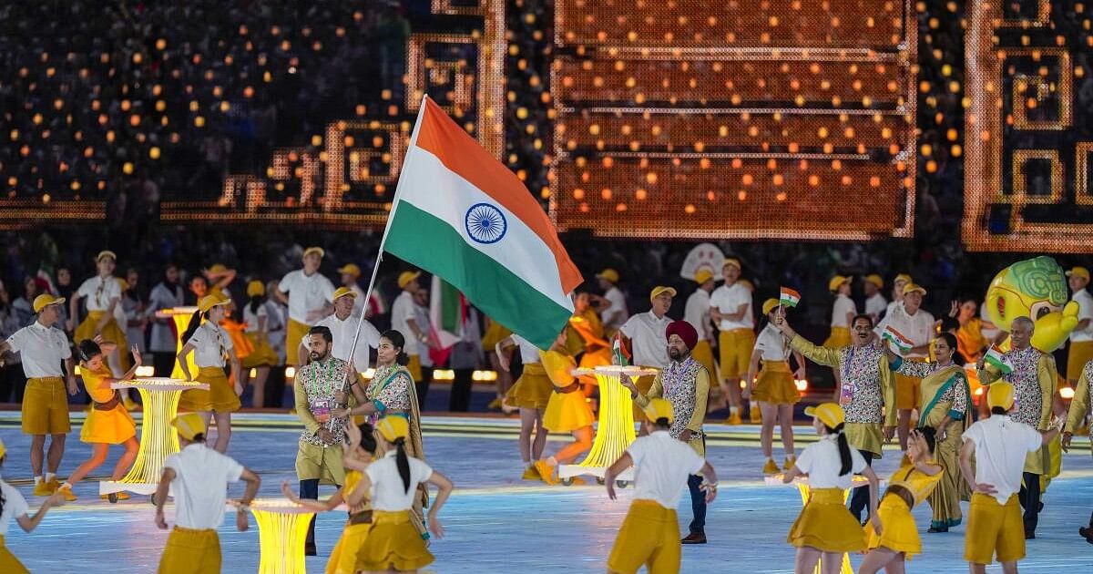 Indian contingent led by Harmanpreet Singh, Lovlina Borgohain at Asian Games opening ceremony