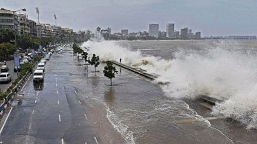 <div class="paragraphs"><p>A high tide inundates Marine drive in Mumbai. </p></div>