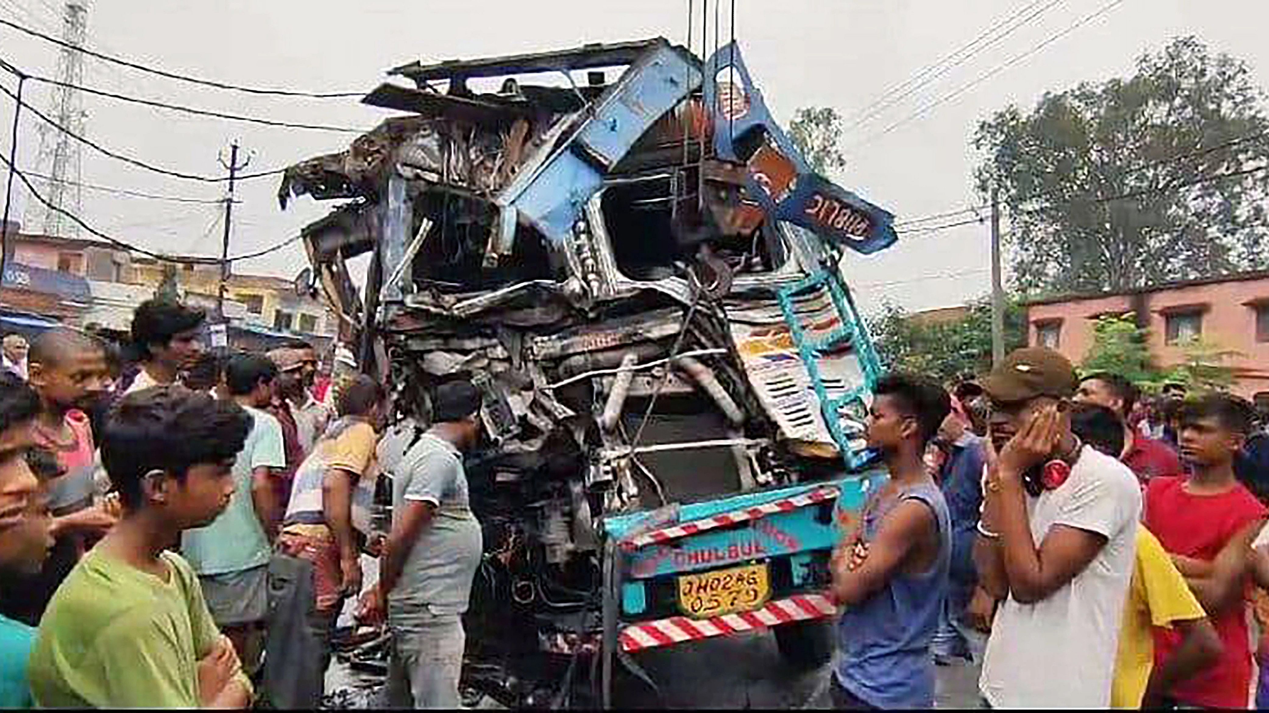 <div class="paragraphs"><p>Locals gather at the site after a truck accident in Ramgarh district, Jharkhand.</p></div>