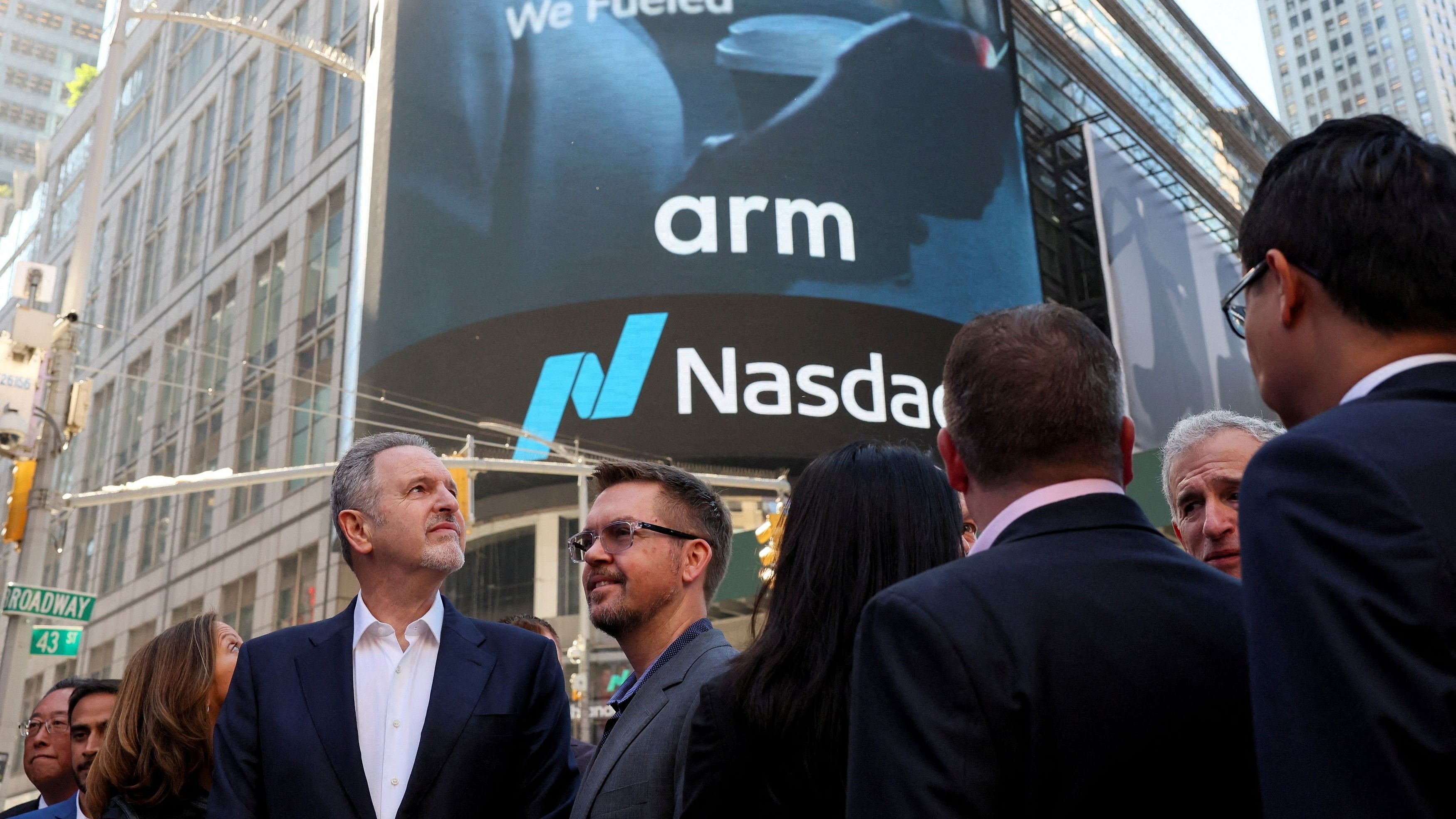 <div class="paragraphs"><p>Arm executives and CEO Rene Haas gather outside Nasdaq Market site, as Softbank's Arm, chip design firm, holds an initial public offering , in New York</p></div>