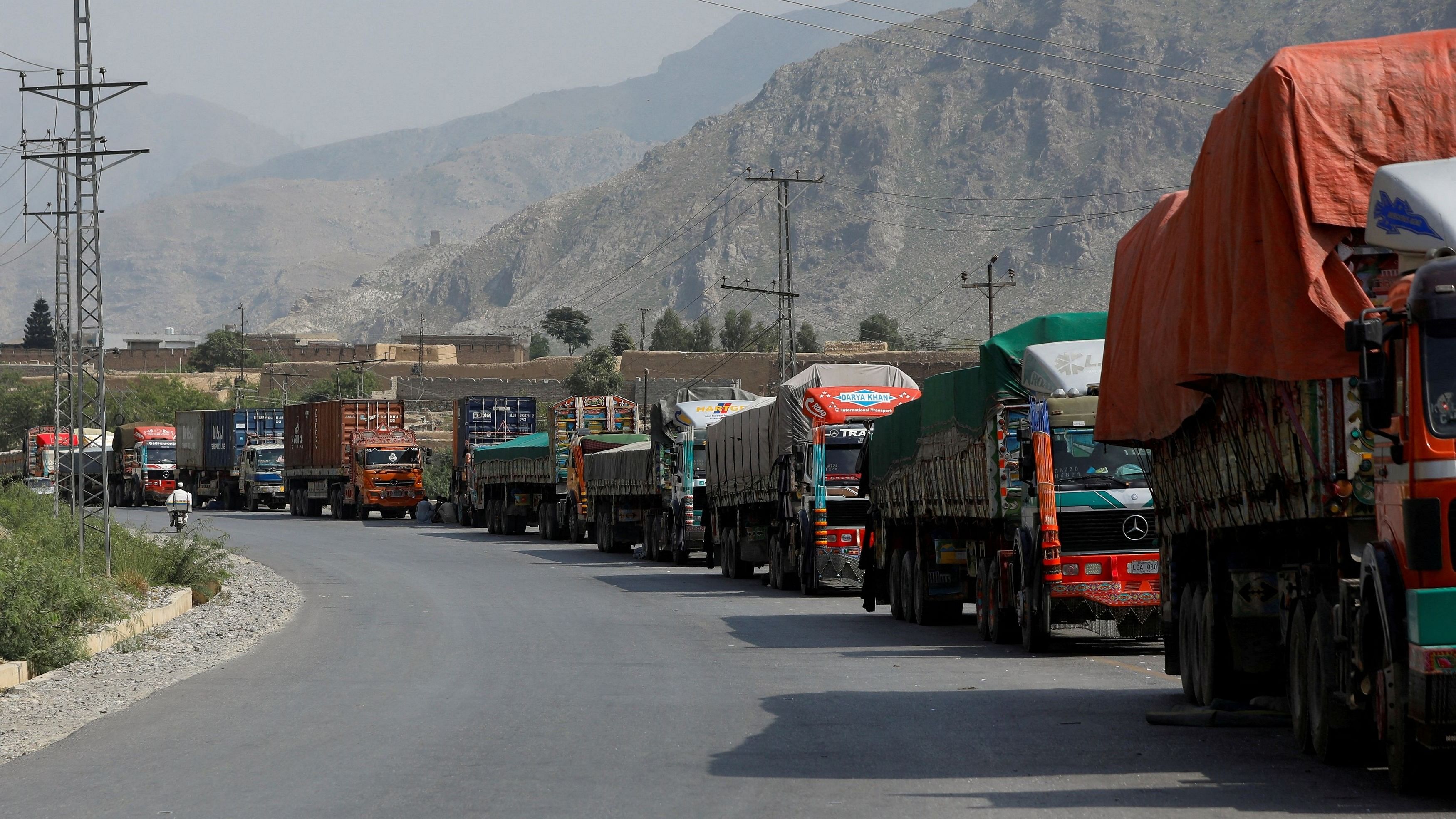 <div class="paragraphs"><p>Trucks loaded with supplies to leave for Afghanistan are seen stranded at the Michni checkpost, after the main Pakistan-Afghan border crossing closed after clashes, in Torkham.</p></div>