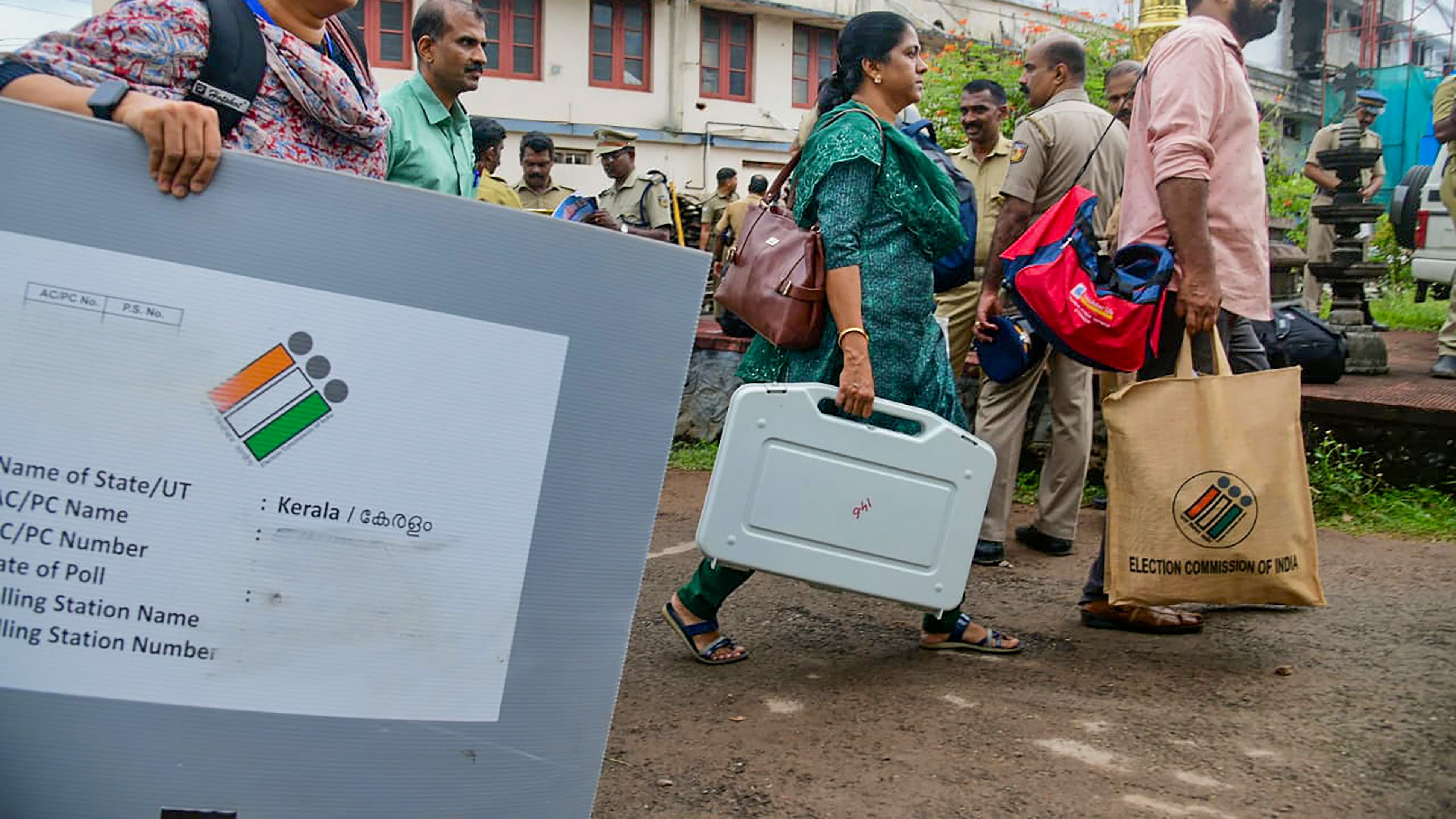 <div class="paragraphs"><p>Polling officials carrying election material on the way to their respective polling booths ahead of Puthuppally Assembly constituency bypoll.</p></div>