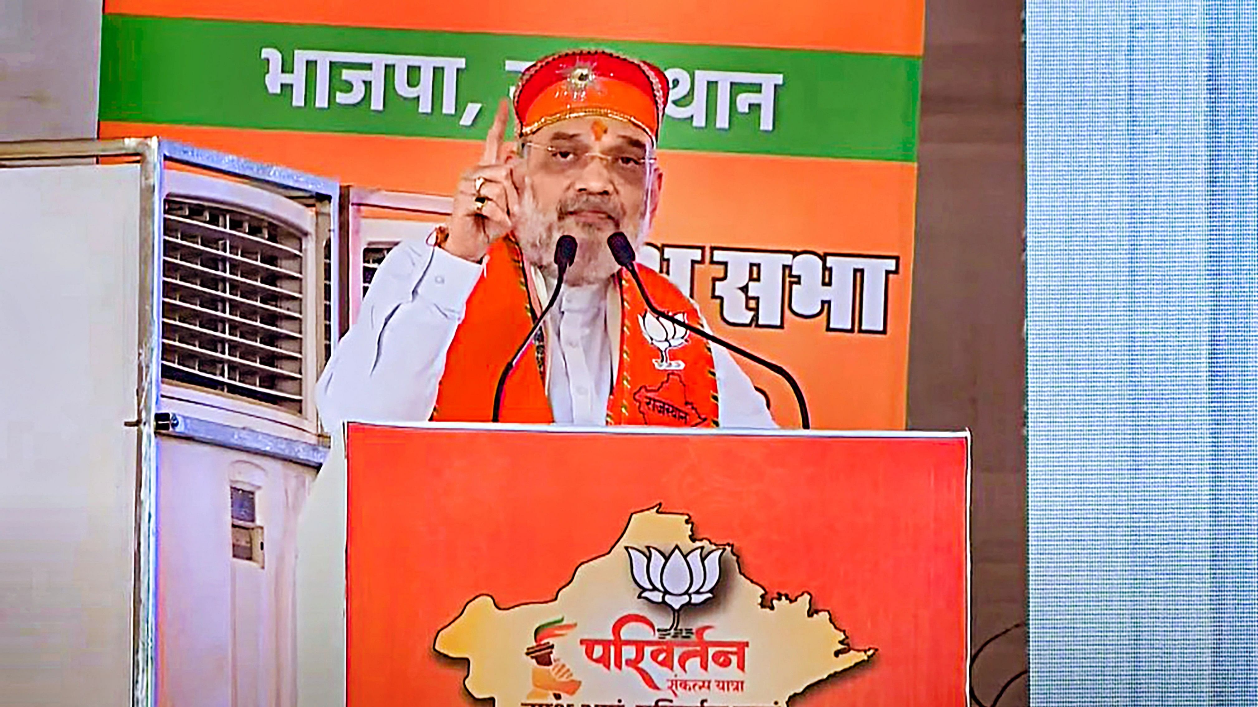 <div class="paragraphs"><p>Union Home Minister Amit Shah speaks during the inauguration of 'Parivartan Sankalp Yatra</p></div>