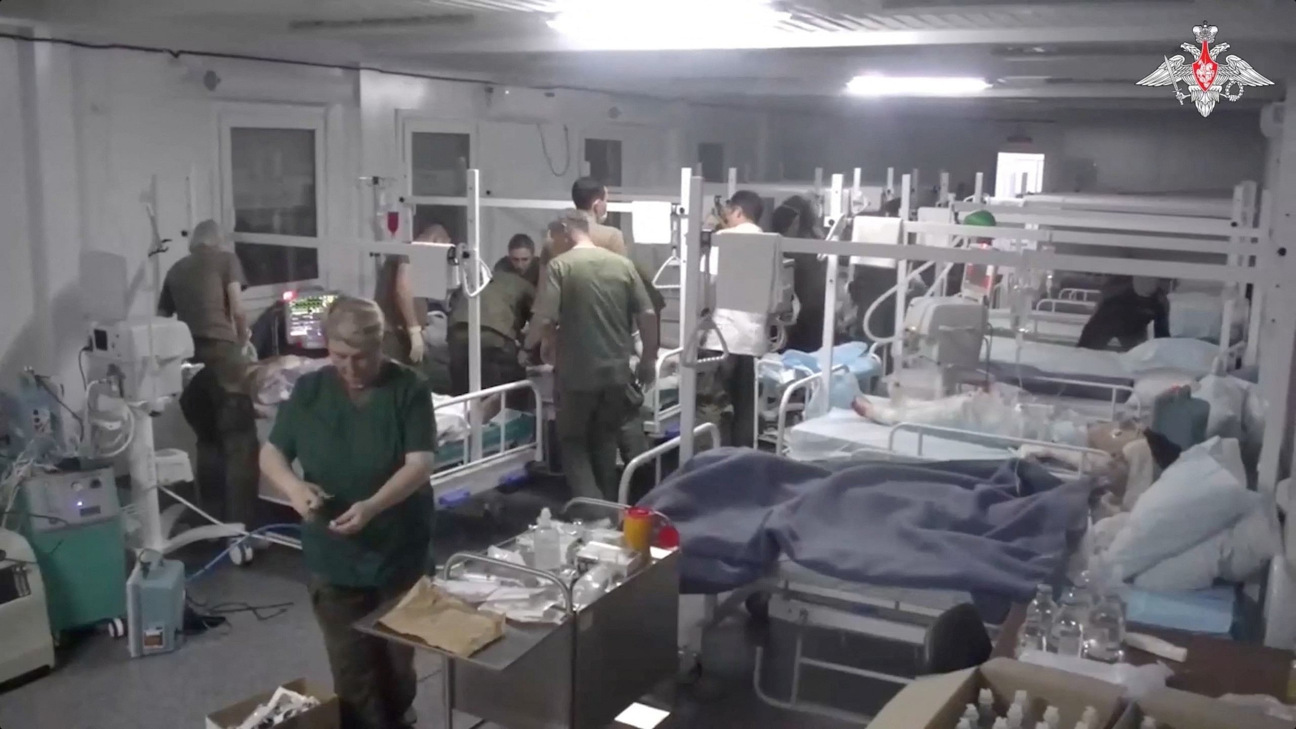<div class="paragraphs"><p>Medics of the Russian peacekeeping troops treat people injured in an explosion at a fuel depot outside Stepanakert, in an unknown location in Nagorno-Karabakh, a region inhabited by ethnic Armenians, in this still image from video published September 26, 2023.  </p></div>