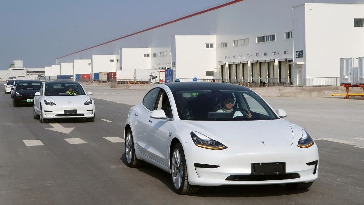 <div class="paragraphs"><p>China-made Tesla Model 3 vehicles are seen at the Shanghai Gigafactory of the US electric car maker in Shanghai. </p></div>