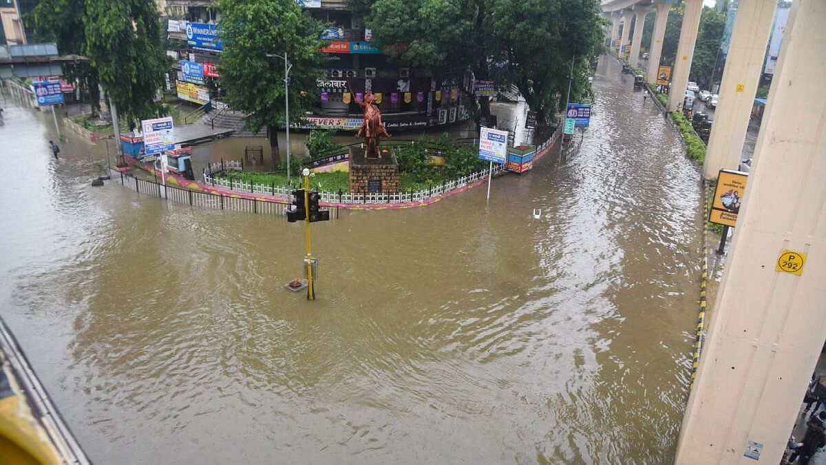 <div class="paragraphs"><p>Waterlogged road at Jhansi Rani square after heavry rains, in Nagpur.&nbsp;</p></div>