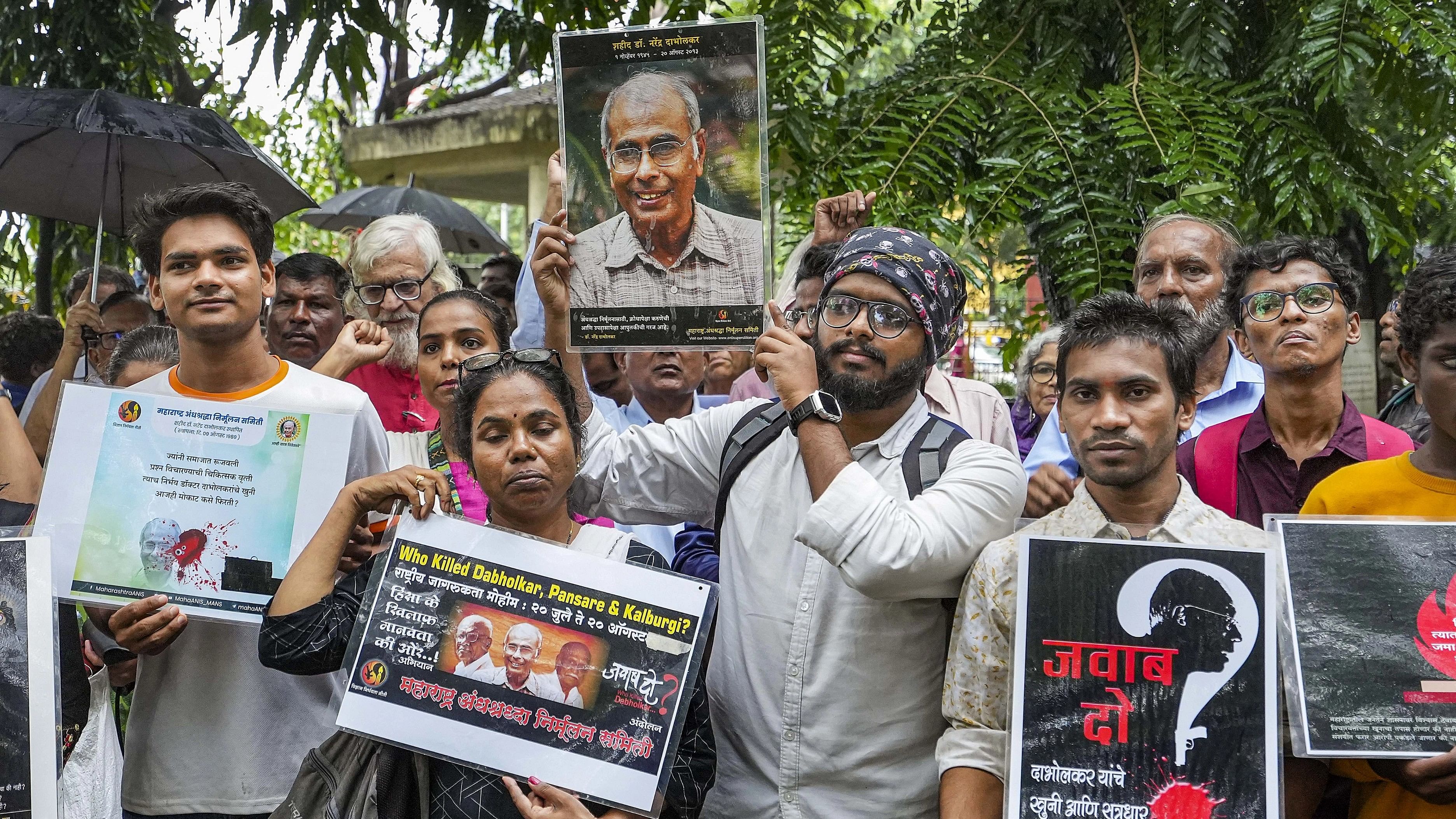 <div class="paragraphs"><p>Maharashtra Andhashraddha Nirmulan Samiti members take part in a 'Nirbhay' rally on the 10th death anniversary of Narendra Dabholkar, in Mumbai.</p></div>