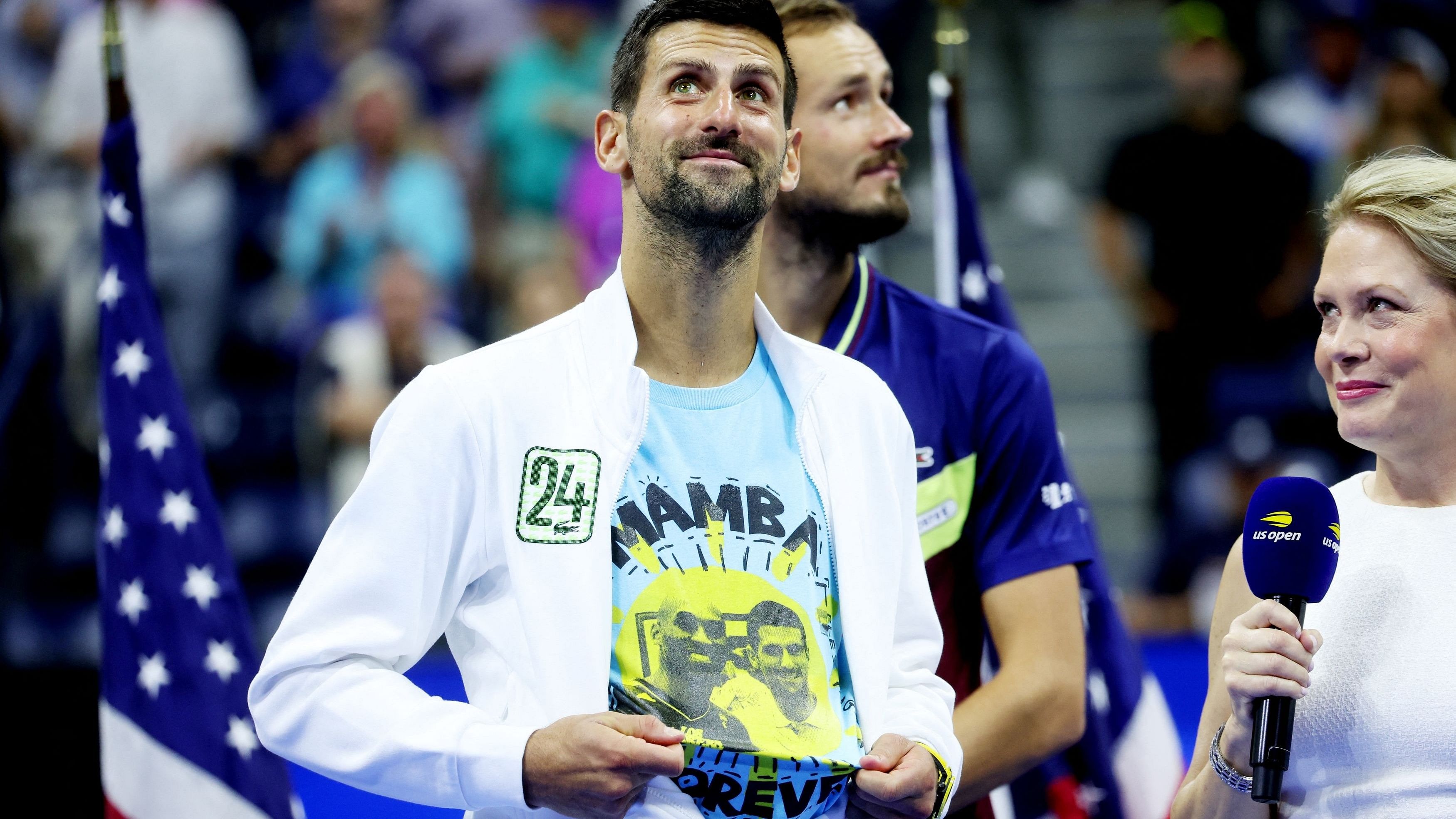 <div class="paragraphs"><p>Novak Djokovic celebrates while wearing a shirt with an image of Kobe Bryant after winning the US Open </p></div>