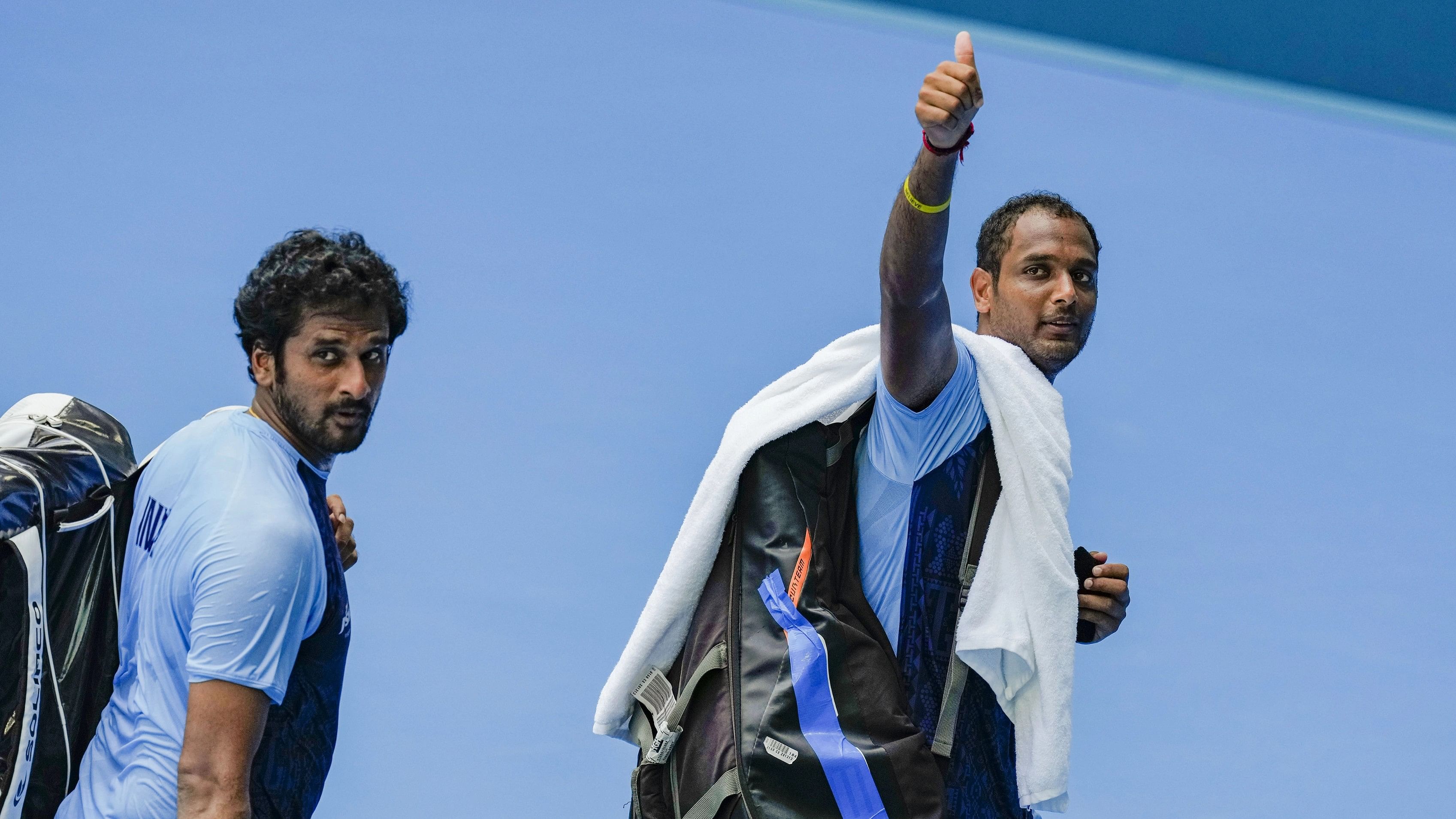 <div class="paragraphs"><p>India's Ramkumar Ramanathan (R) and Saketh Myneni leave after losing men's doubles final tennis match against Chinese Taipei's Yu-Hsiou Hsu and Jason Jung to settle for the silver medal at the 19th Asian Games.</p></div>