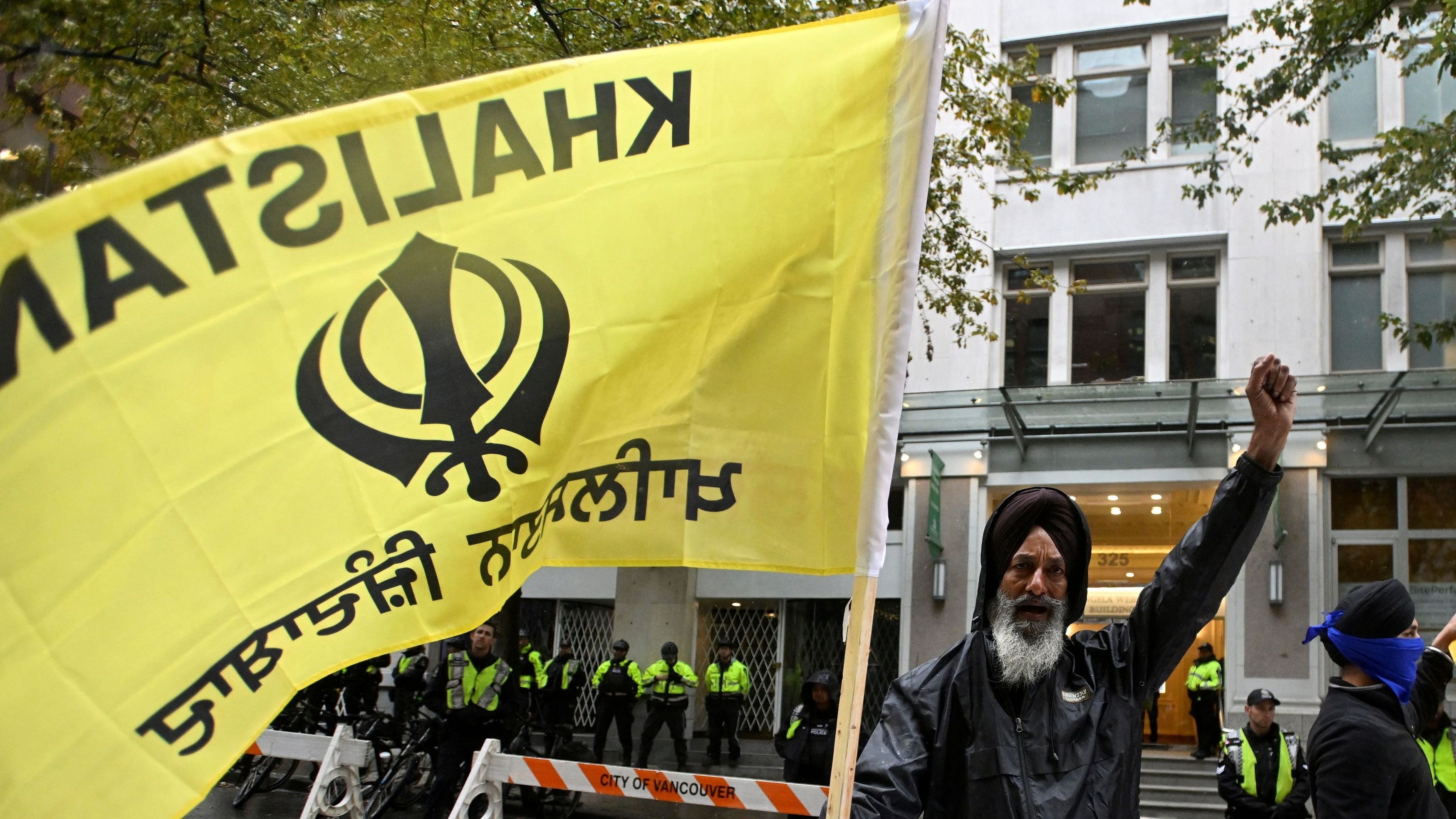 <div class="paragraphs"><p>A supporter waves  pro-independence Khalistan flag.</p></div>