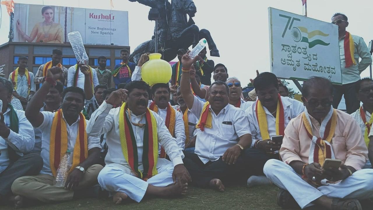 <div class="paragraphs"><p>Members of different organisations stage protest at Chennamma Circle in Hubballi on Friday. </p></div>