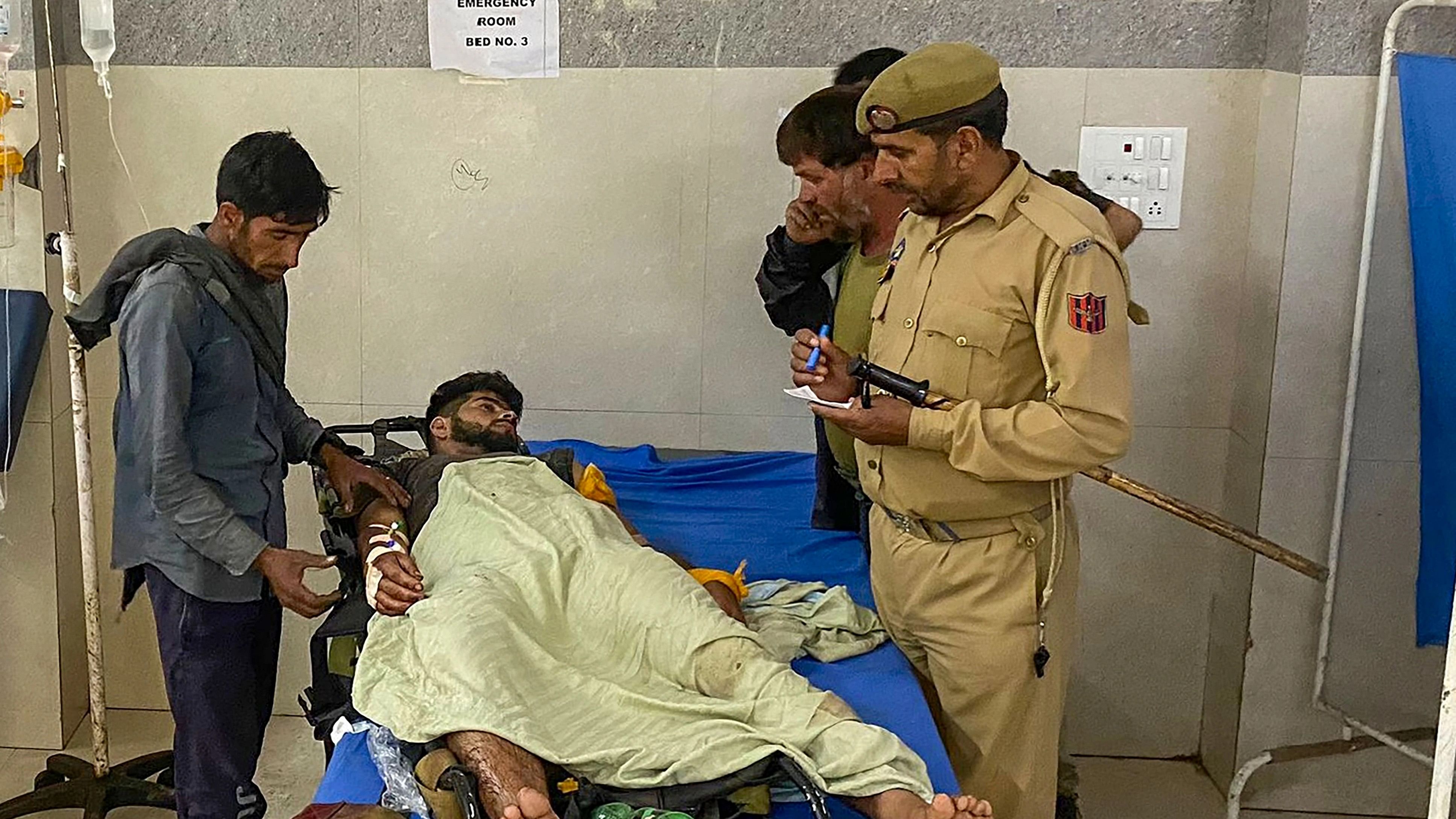 <div class="paragraphs"><p>An Army porter receives treatment after he was injured.</p></div>