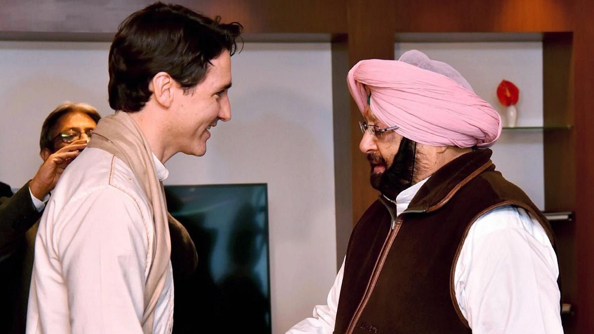 <div class="paragraphs"><p>Canadian Prime Minister Justin Trudeau shakes hands with former Punjab Chief Minister Amarinder Singh.</p></div>