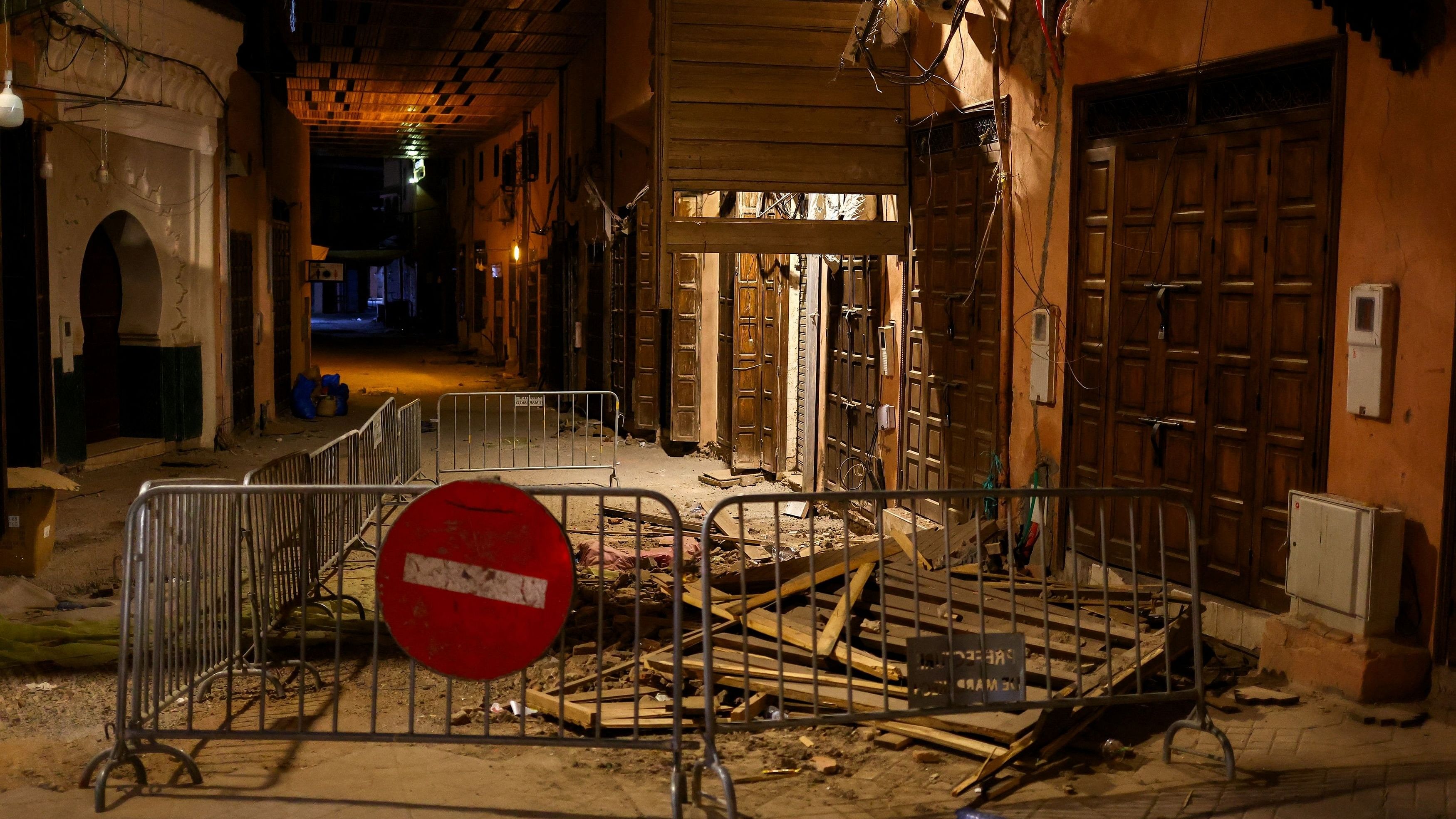 <div class="paragraphs"><p>Barricades are placed around debris scattered next to damaged buildings on a street in Marrakesh, following a powerful earthquake in Morocco, September 9, 2023. </p></div>