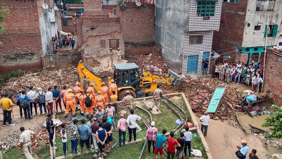 <div class="paragraphs"><p>Rescue operation underway after a house collapsed due to cylinder explosion, in Ghaziabad.</p></div>