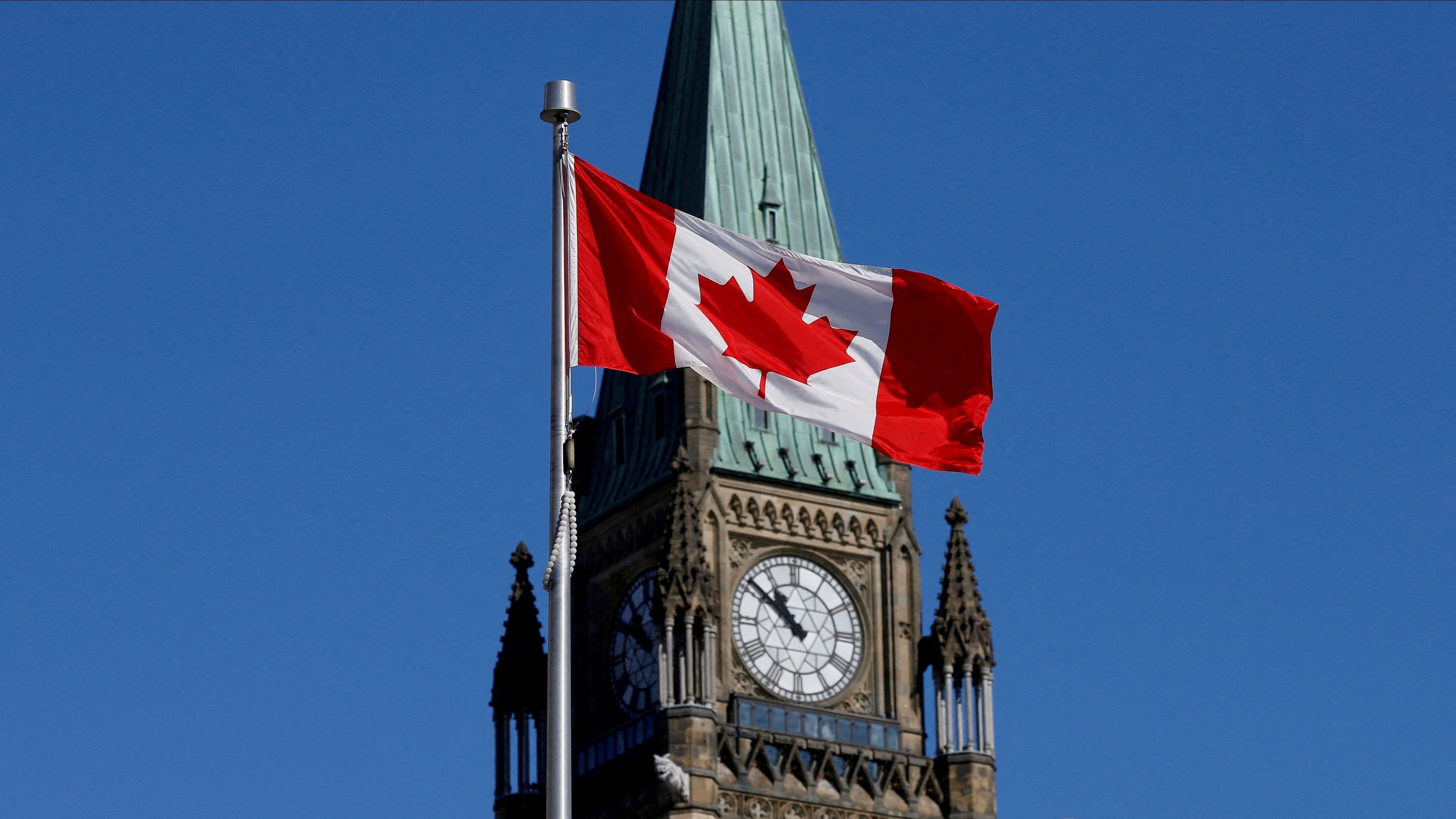 <div class="paragraphs"><p>Canadian flag flies in front of the Peace Tower on Parliament Hill in Ottawa, Ontario, Canada.</p></div>