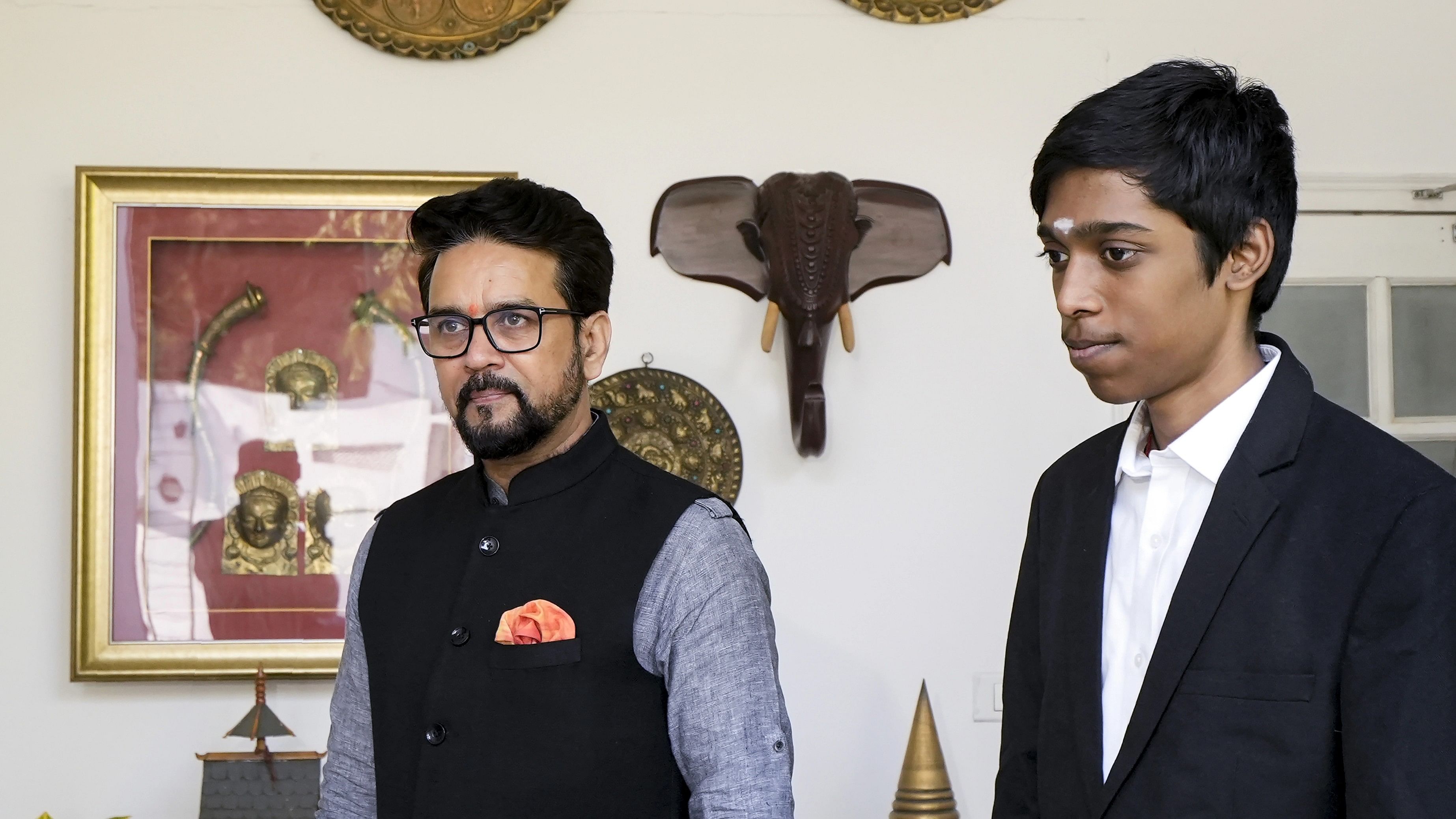 <div class="paragraphs"><p>Union Minister of Youth Affairs and Sports Anurag Thakur with FIDE World Cup 2023 runner-up Grandmaster R Praggnanandhaa during a felicitation ceremony at his residence.</p></div>