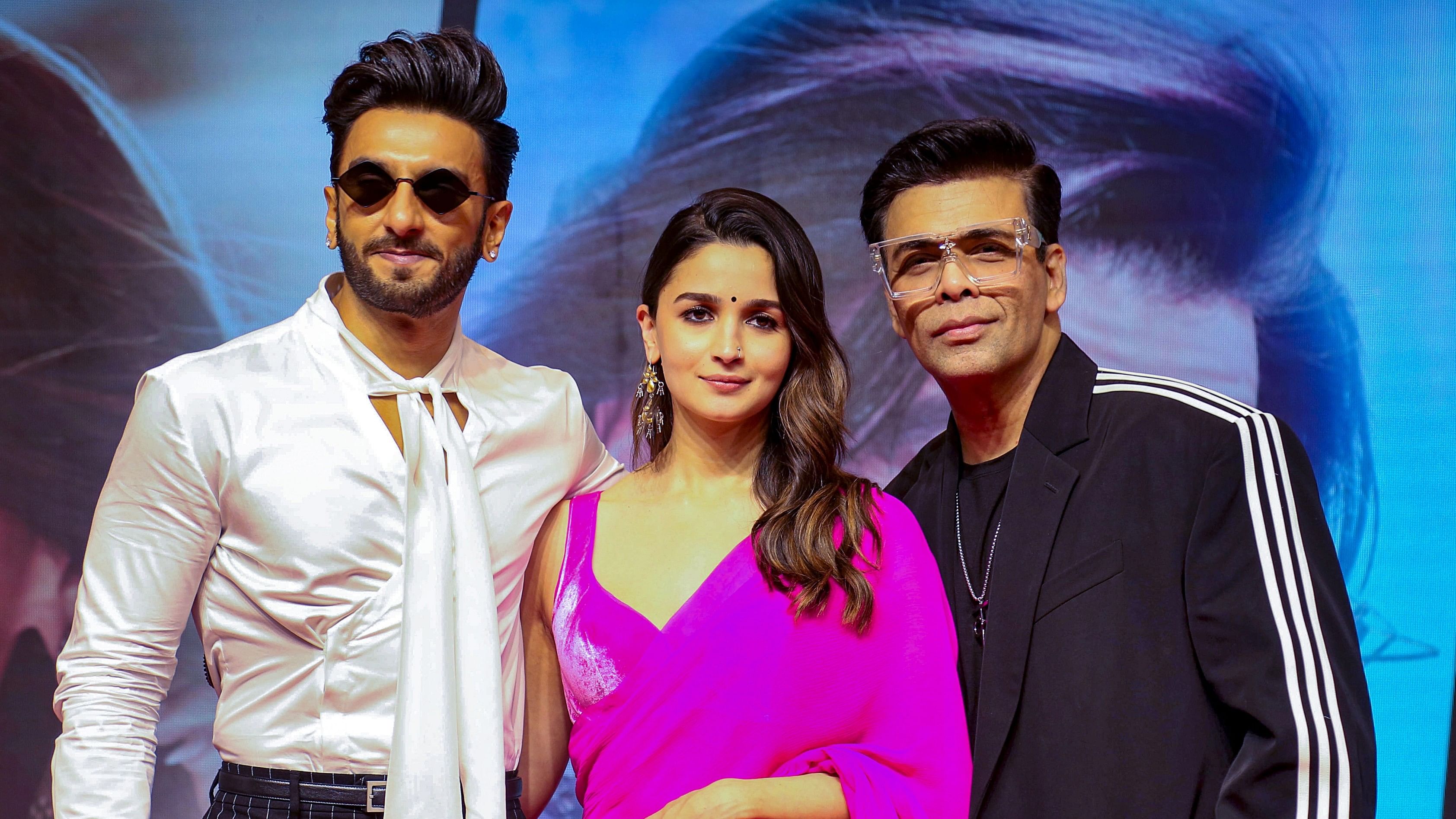 <div class="paragraphs"><p>Actors Alia Bhatt and Ranveer Singh with filmmaker Karan Johar during a press conference of their film 'Rocky Aur Rani Ki Prem Kahani'.&nbsp;</p></div>