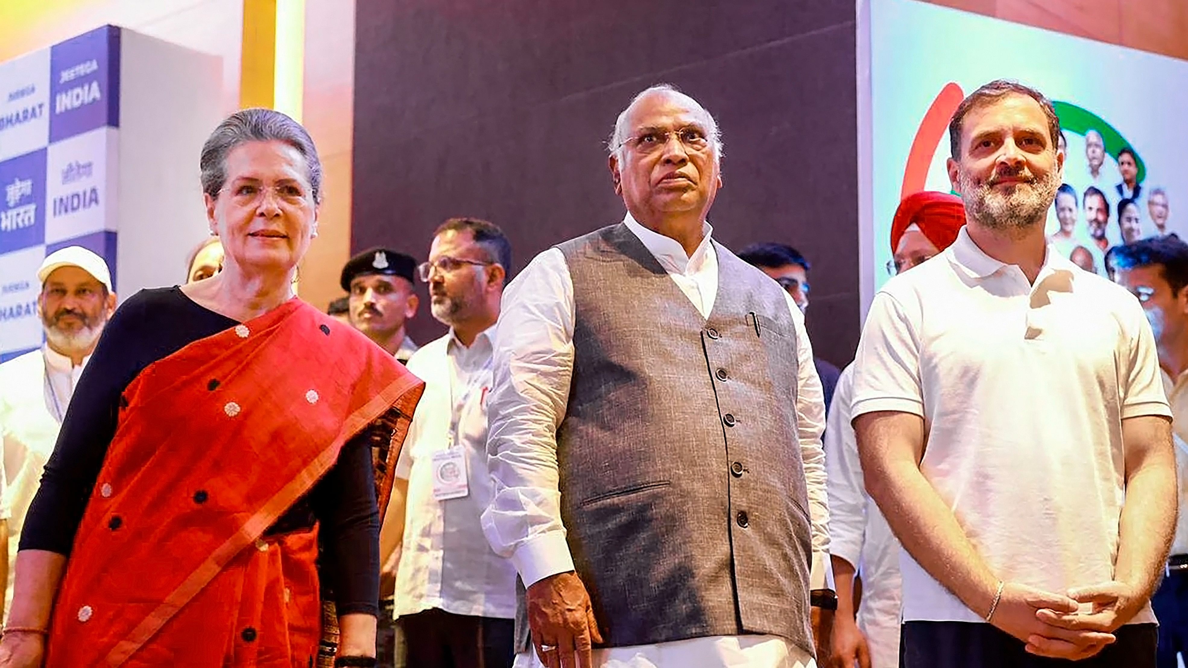 <div class="paragraphs"><p>Congress chief Mallikarjun Kharge (C), and leaders Sonia (L) and Rahul Gandhi (R).</p></div>