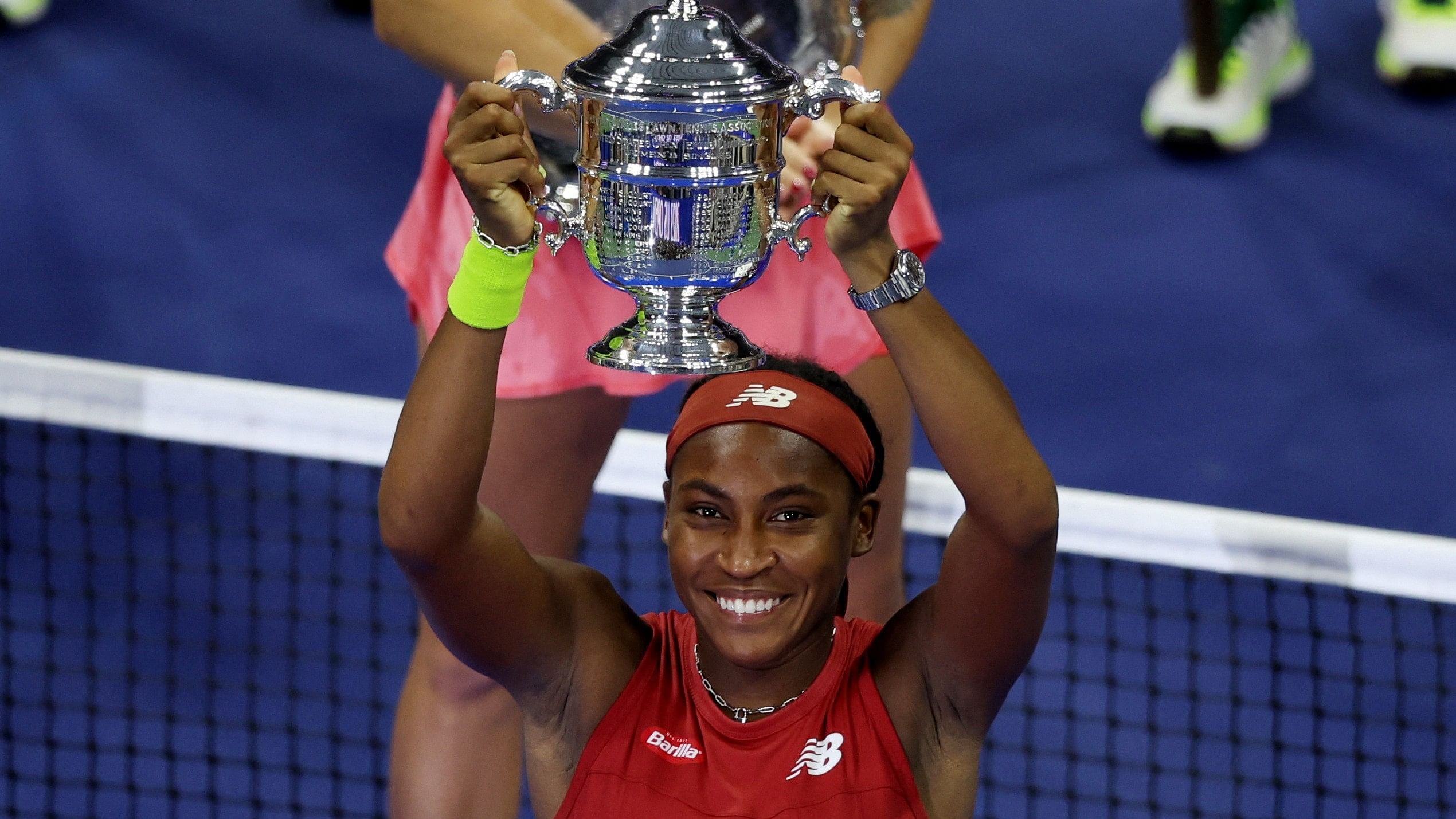 <div class="paragraphs"><p>Coco Gauff of the US celebrates with the trophy after winning the US Open.</p></div>