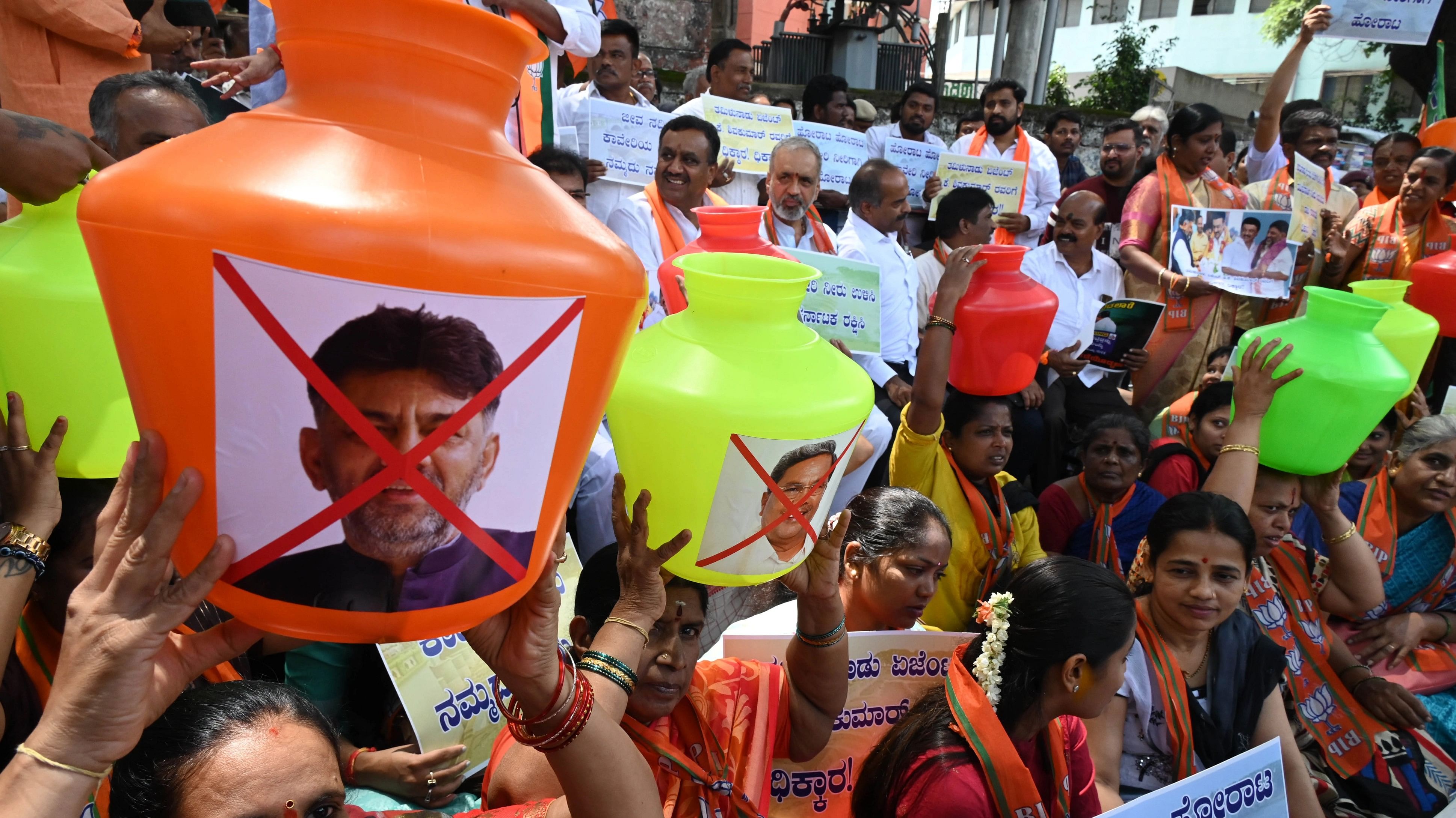 <div class="paragraphs"><p>BJP party leaders and workers during a protest against the state government's release of Cauvery water to Tamil Nadu, at Mysore Bank Circle in Bengaluru on Saturday.</p></div>