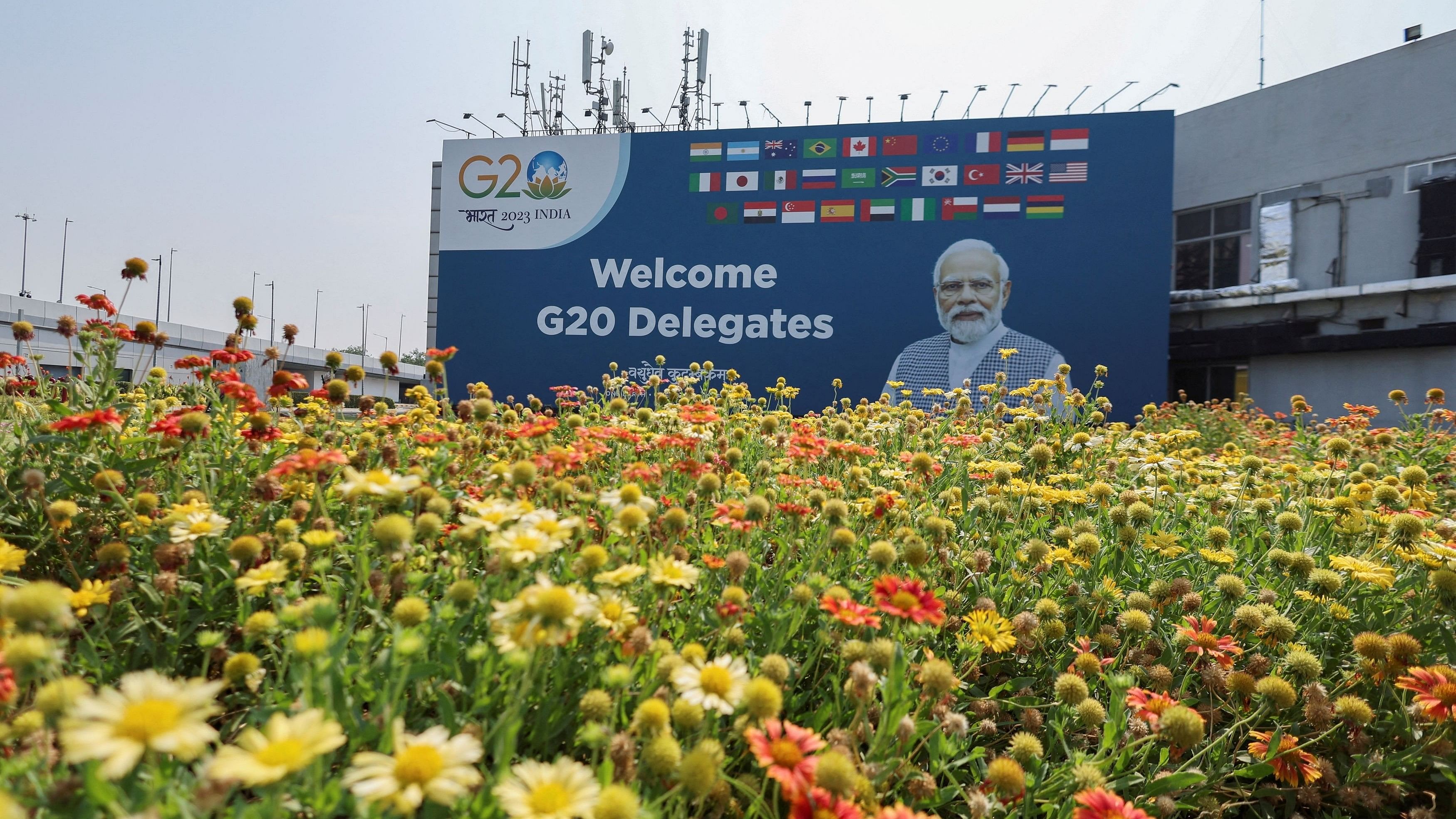 <div class="paragraphs"><p>A hoarding with a picture of Prime Minister Narendra Modi welcoming G20 delegates is seen at the Indira Gandhi International Airport ahead of the G20 Summit, in New Delhi, India, September 5, 2023. </p></div>