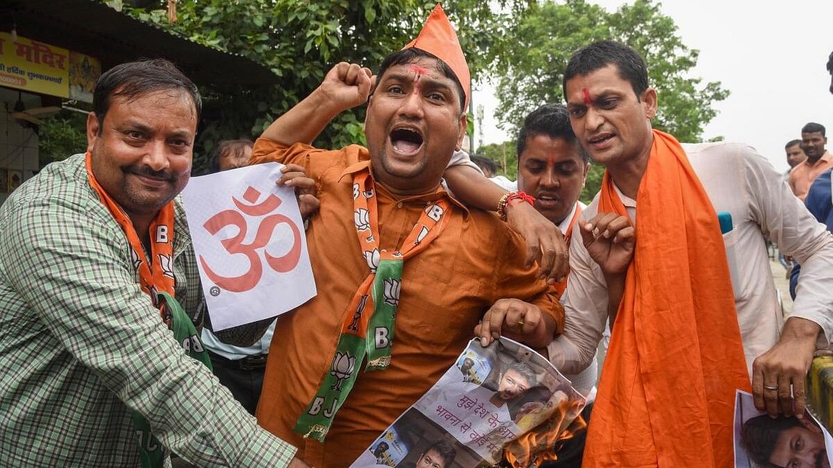 <div class="paragraphs"><p>BJP activists stage a protest against Tamil Nadu Minister Udhayanidhi Stalin over his controversial remarks on 'Sanatan Dharma', in Patna, Monday, Sept 4, 2023.</p></div>