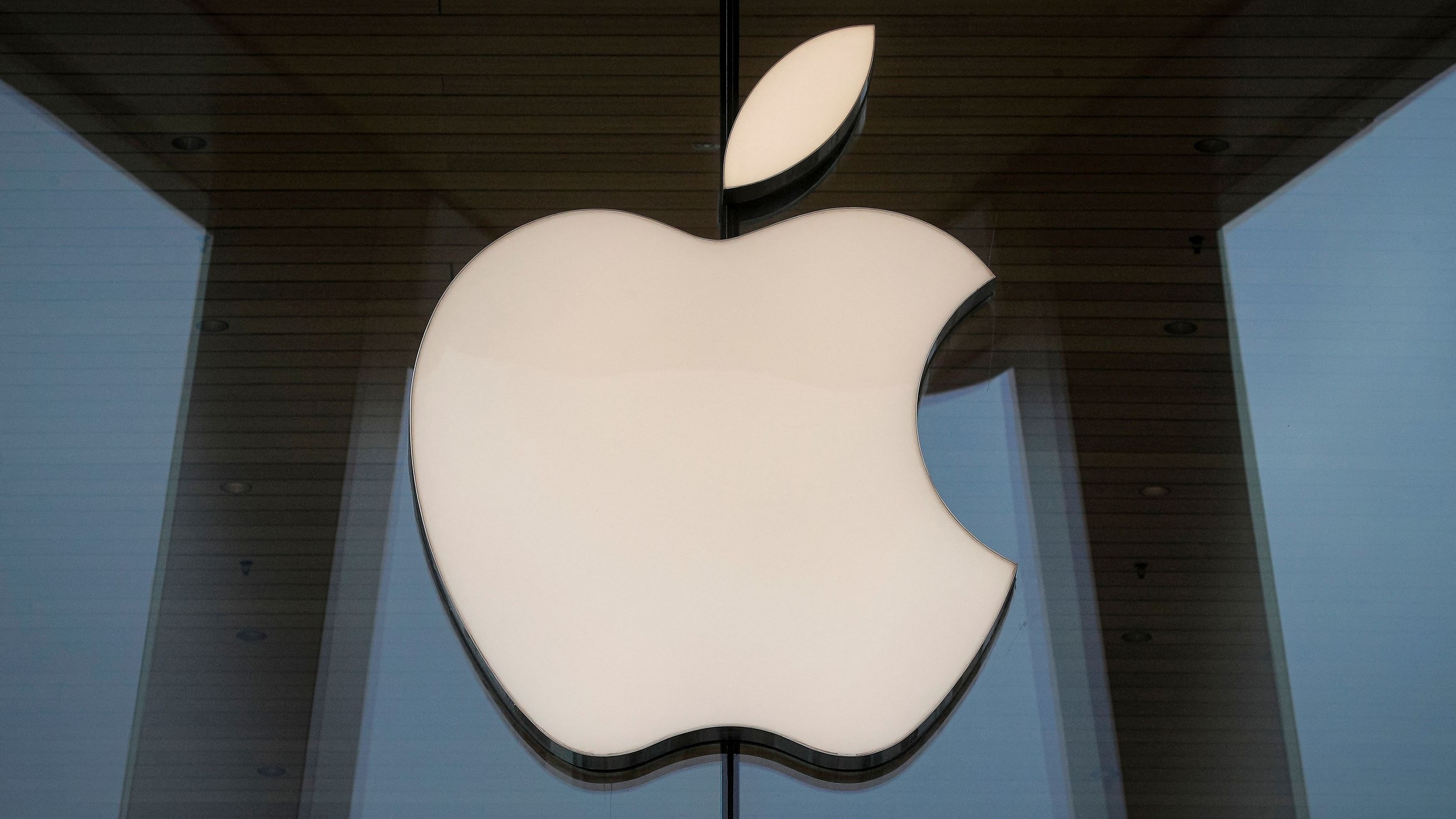 <div class="paragraphs"><p>The Apple logo is seen at an Apple Store, as Apple's new 5G iPhone 12 went on sale in Brooklyn, New York, U.S. October 23, 2020.  </p></div>