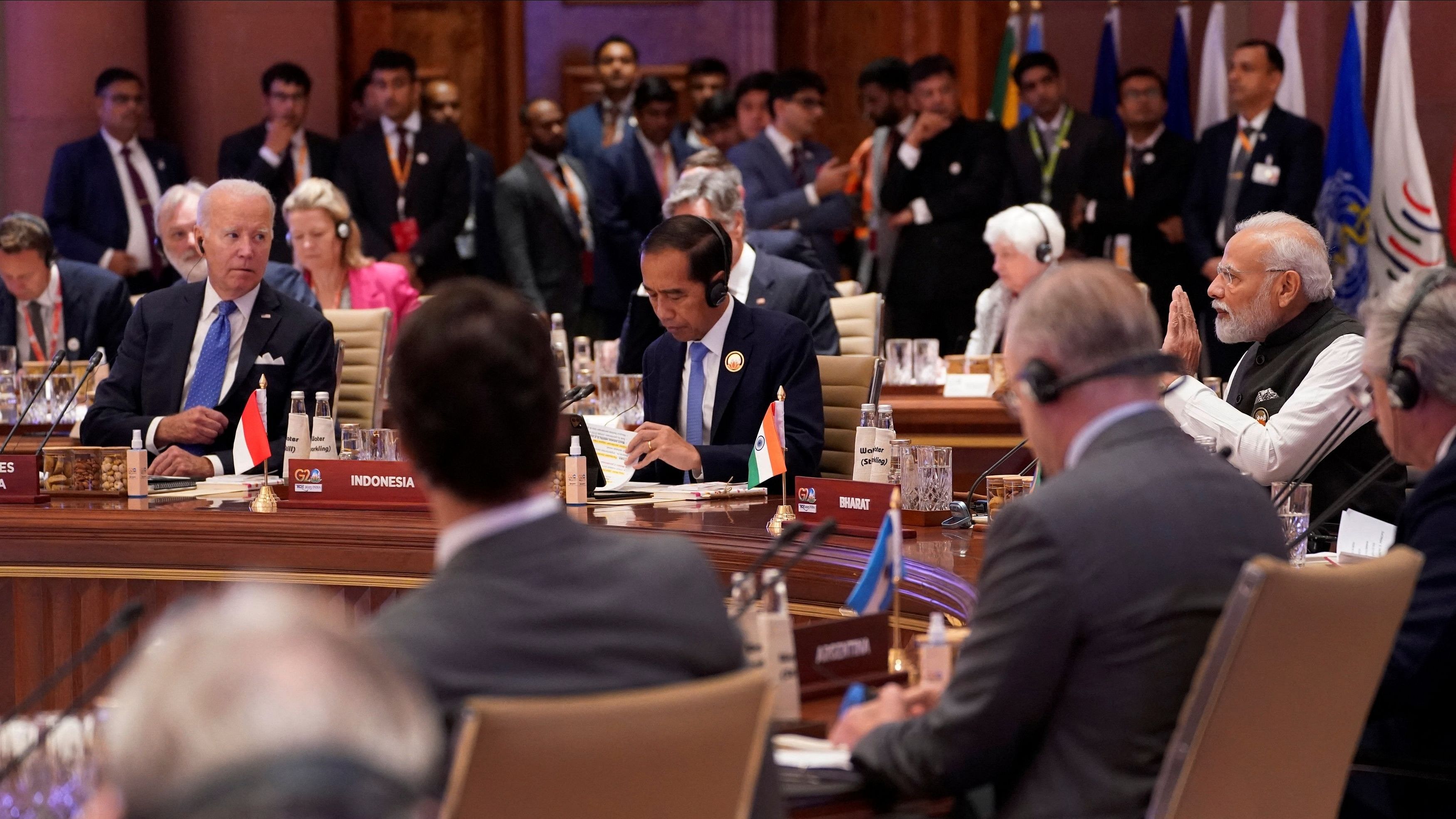 <div class="paragraphs"><p>Indian Prime Minister Narendra Modi speaks as US President Joe Biden with other leaders listen during the first session of the G20 Summit, in New Delhi.</p></div>