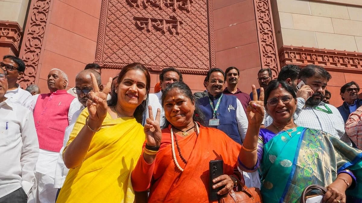 <div class="paragraphs"><p>Union Ministers Bharati Pawar and Sadhvi Niranjan Jyoti and other parliamentarians at the new Parliament building after the Women's reservation Bill was tabled.&nbsp;</p></div>