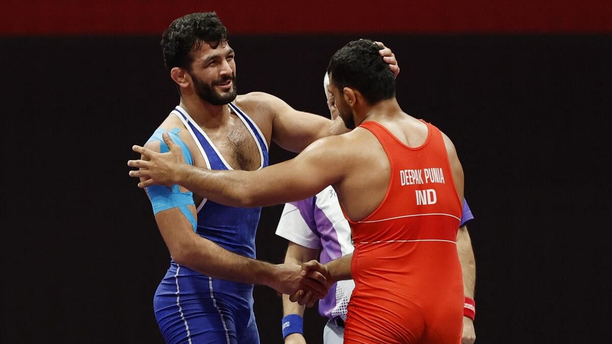 <div class="paragraphs"><p>Iran's Hassan Yazdanicharati and India's Deepak Punia at the Men's Freestyle 86Kg Gold Medal Match</p></div>