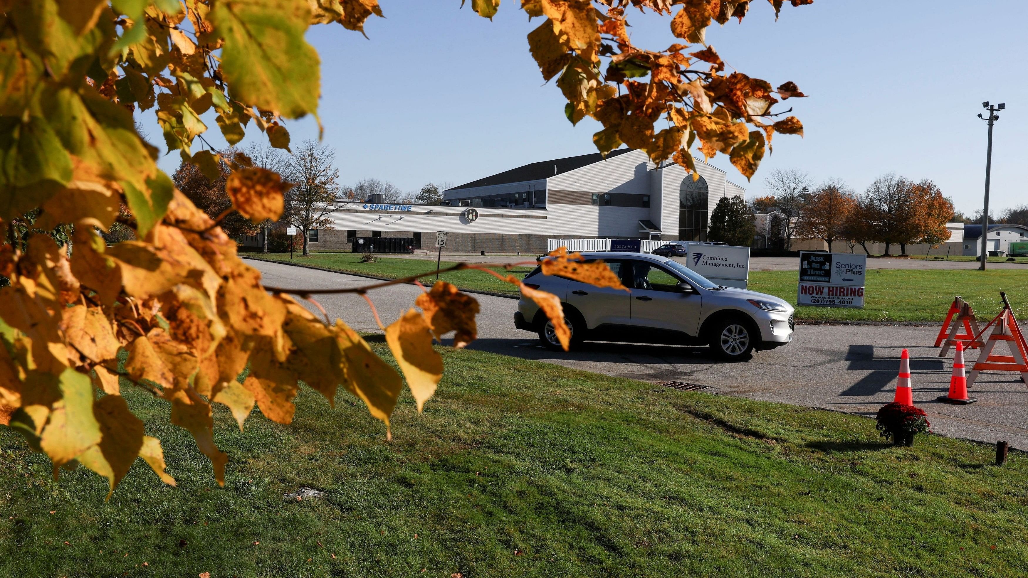 <div class="paragraphs"><p>A car is seen on a blocked road near the Just-In-Time Recreation bowling alley, one of the locations of the deadly mass shootings, in Lewiston, Maine, US, October 28, 2023. </p></div>