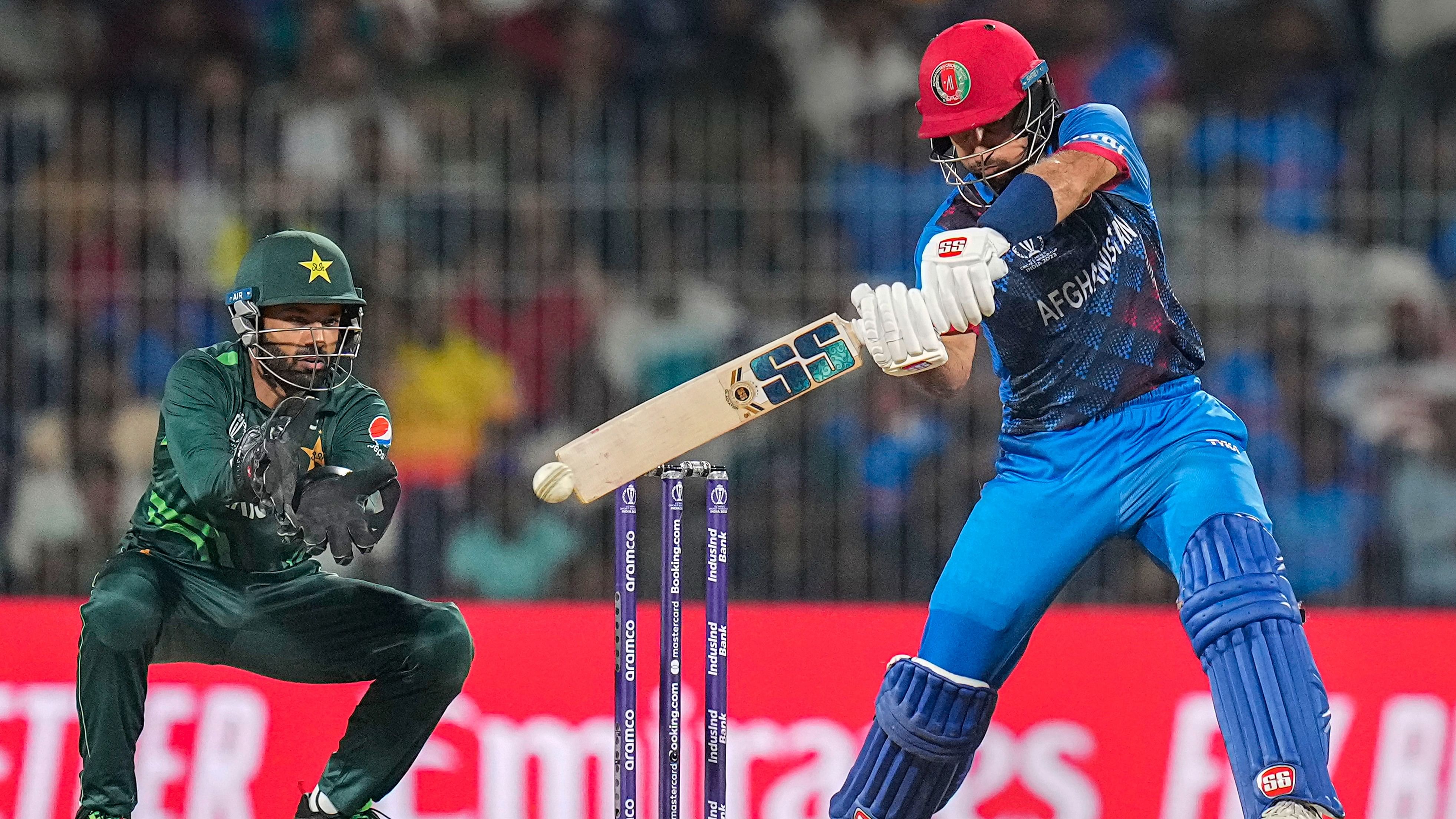 <div class="paragraphs"><p>Afghanistan's Rahmat Shah plays a shot during the ICC Men's Cricket World Cup 2023 match between Pakistan and Afghanistan, at MA Chidambaram Stadiumin, in Chennai, Monday, Oct. 23, 2023.</p></div>