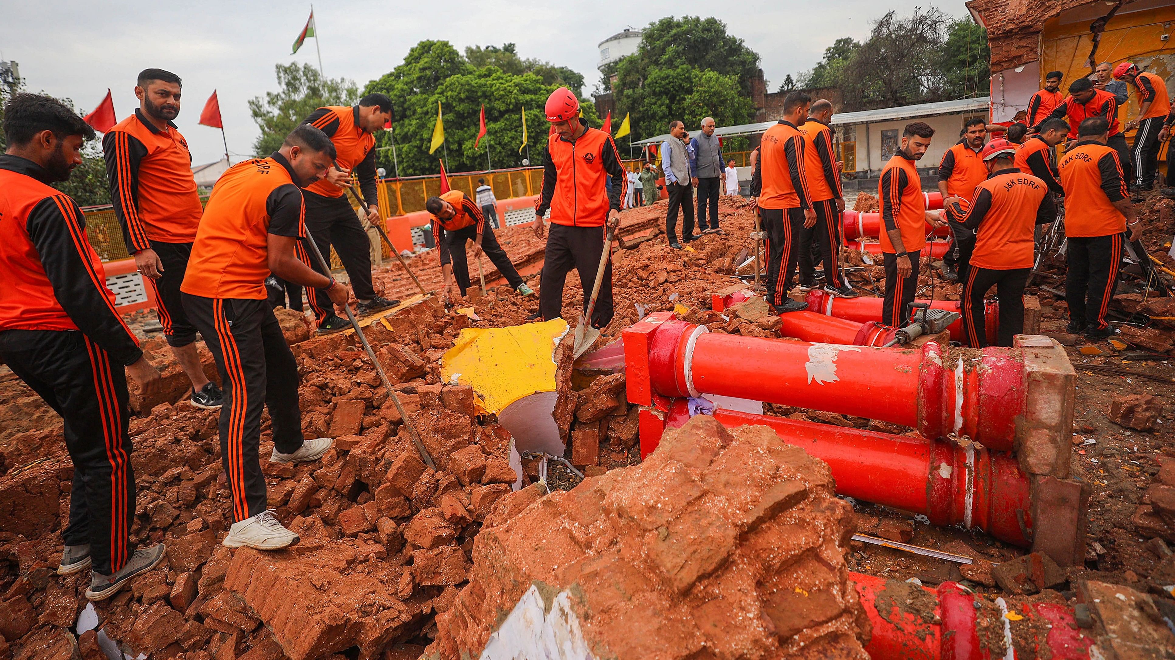 <div class="paragraphs"><p>Jammu: SDRF personnel at the site after a portion of a temple collapsed, in Jammu, Tuesday, Oct. 17, 2023. </p></div>