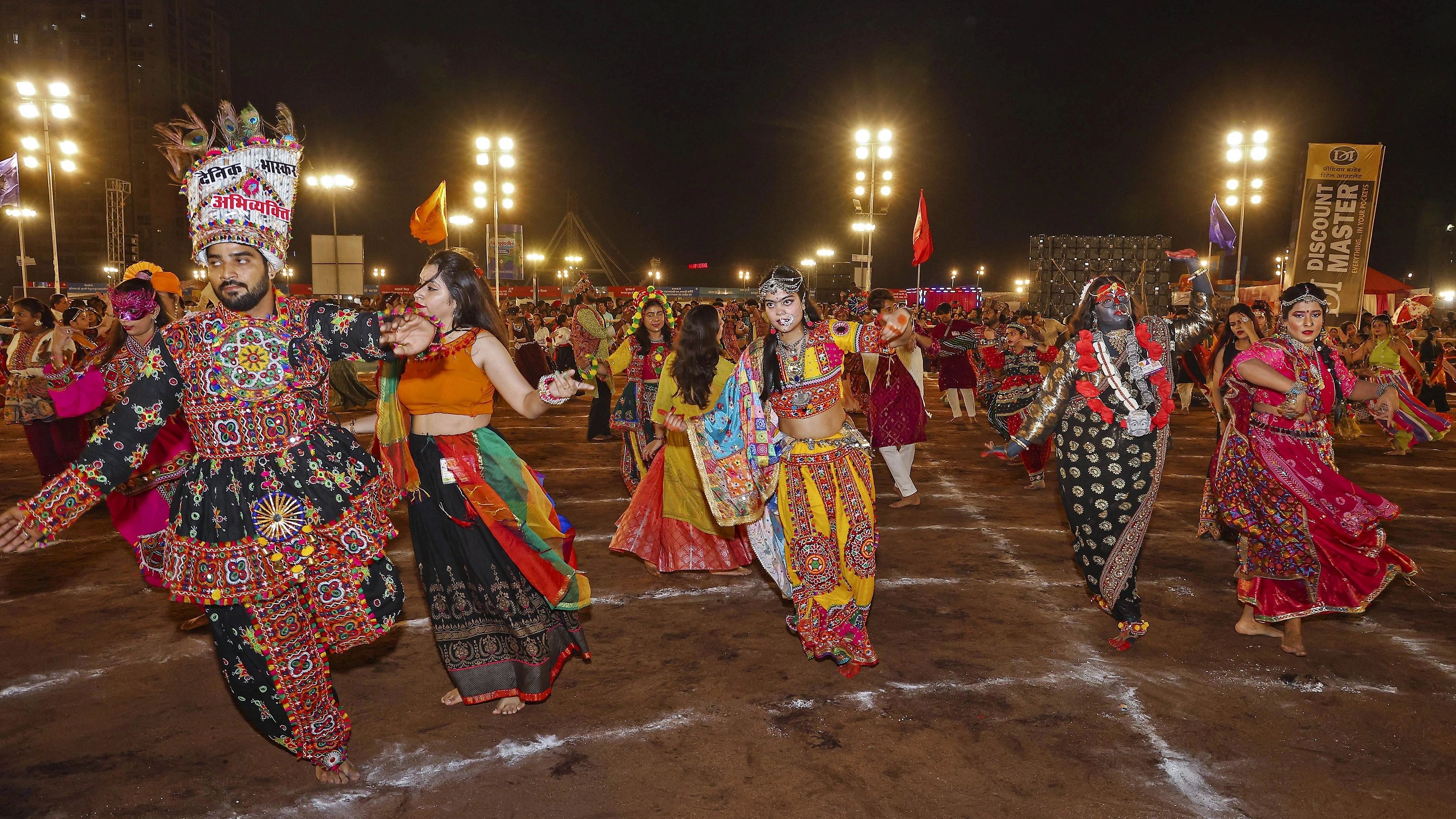 <div class="paragraphs"><p>Participants at a 'Garba' performance  during the nine-day long Navratri festival.</p></div>