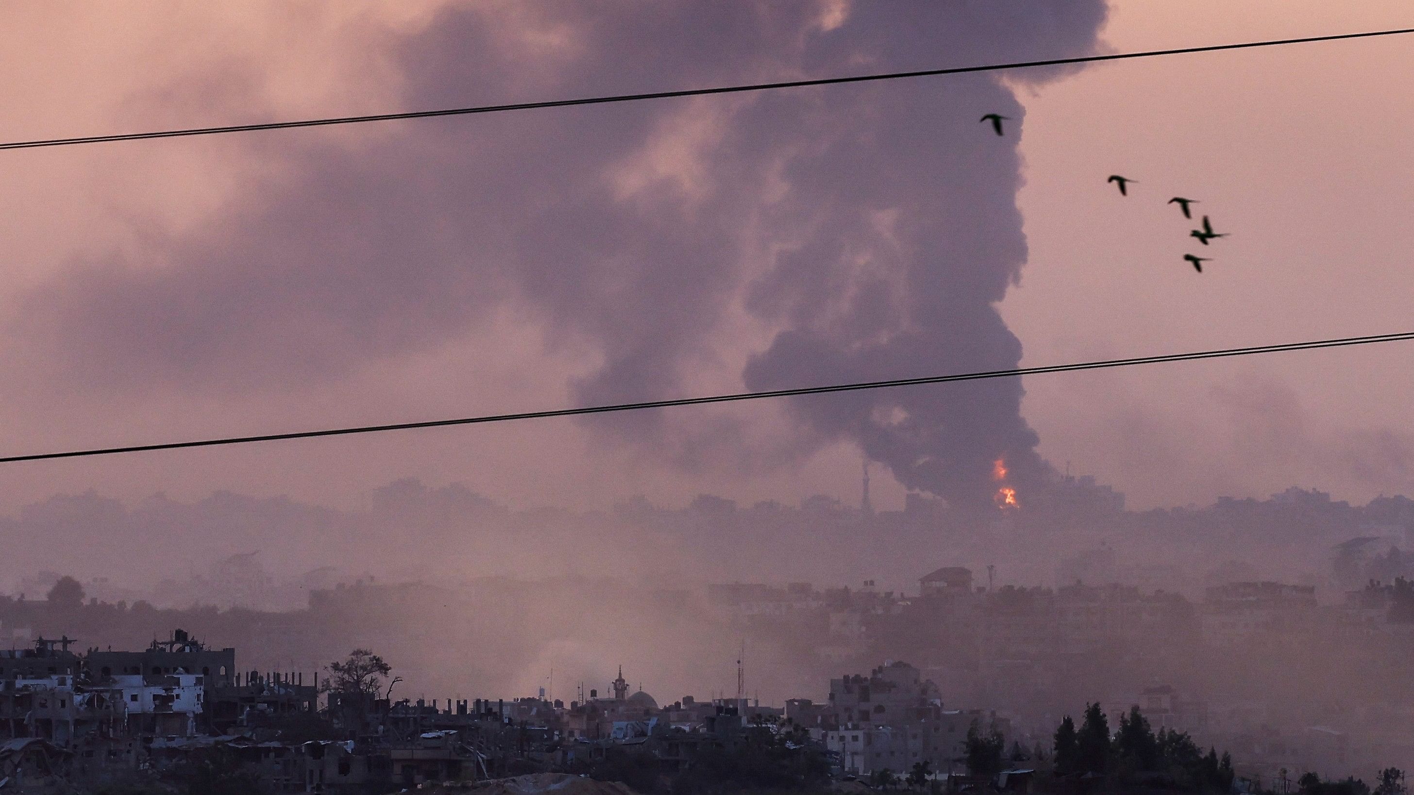 <div class="paragraphs"><p>Smoke rises over Gaza, as seen from Israel's border with Gaza, in southern Israel.</p></div>