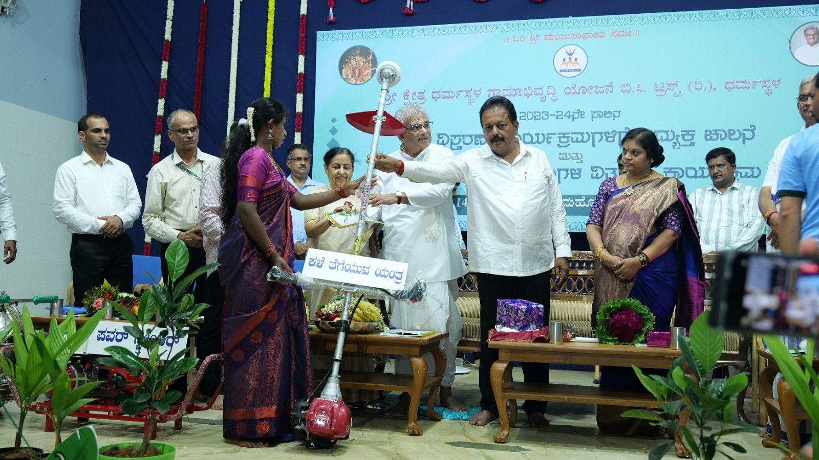 <div class="paragraphs"><p>Agriculture minister N Cheluvarayaswamy distributes a farm equipment during the launch of agriculture extension programme of Sri Kshetra Dharmastala Rural Development Project at Ujire.</p></div>