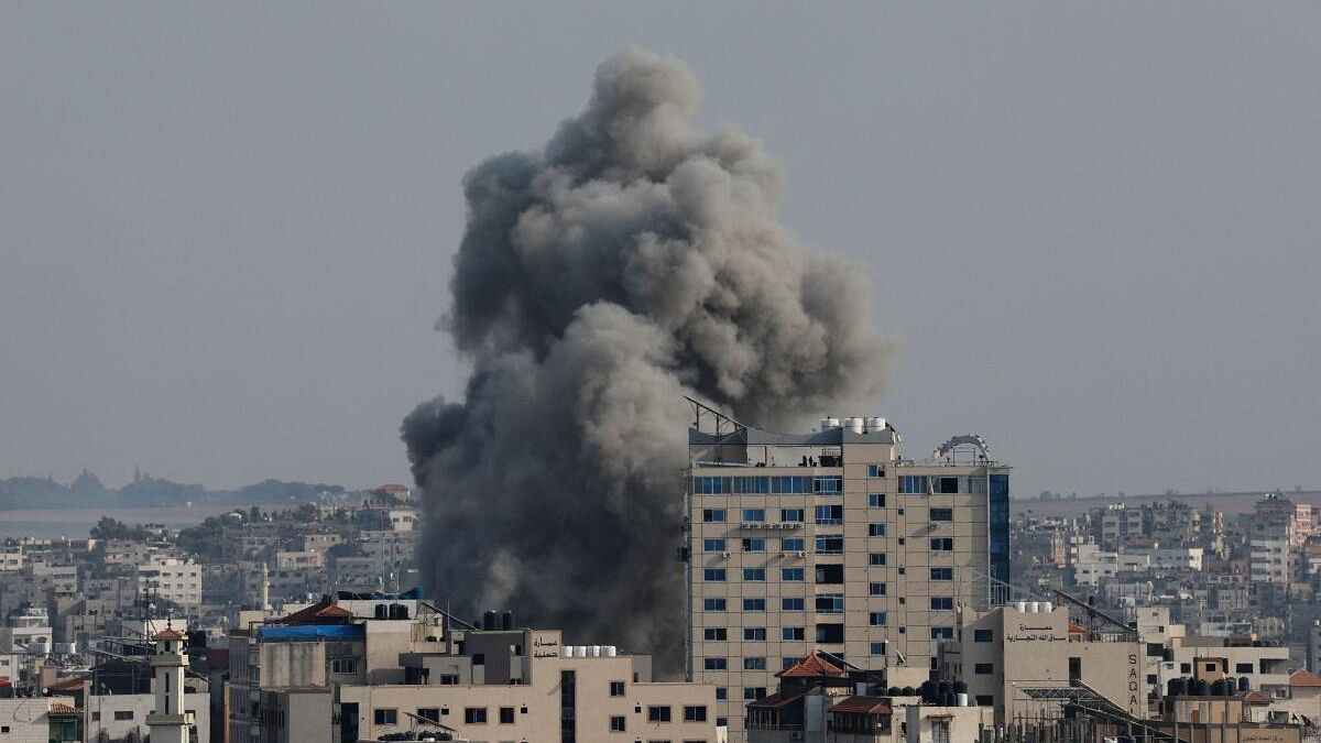 <div class="paragraphs"><p>Smoke rises following Israeli strikes in Gaza.</p></div>