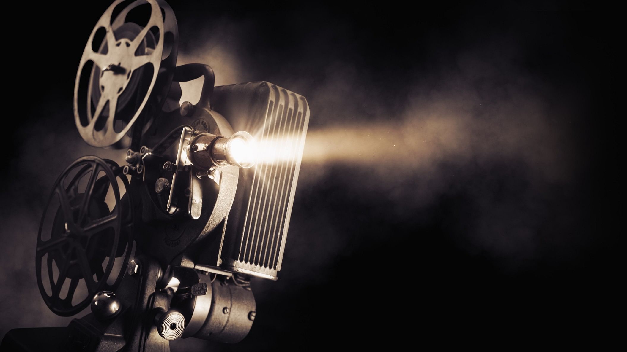 <div class="paragraphs"><p>A picture showing movie projector on a dark background with light beam.</p></div><div class="paragraphs"><p><br></p></div>