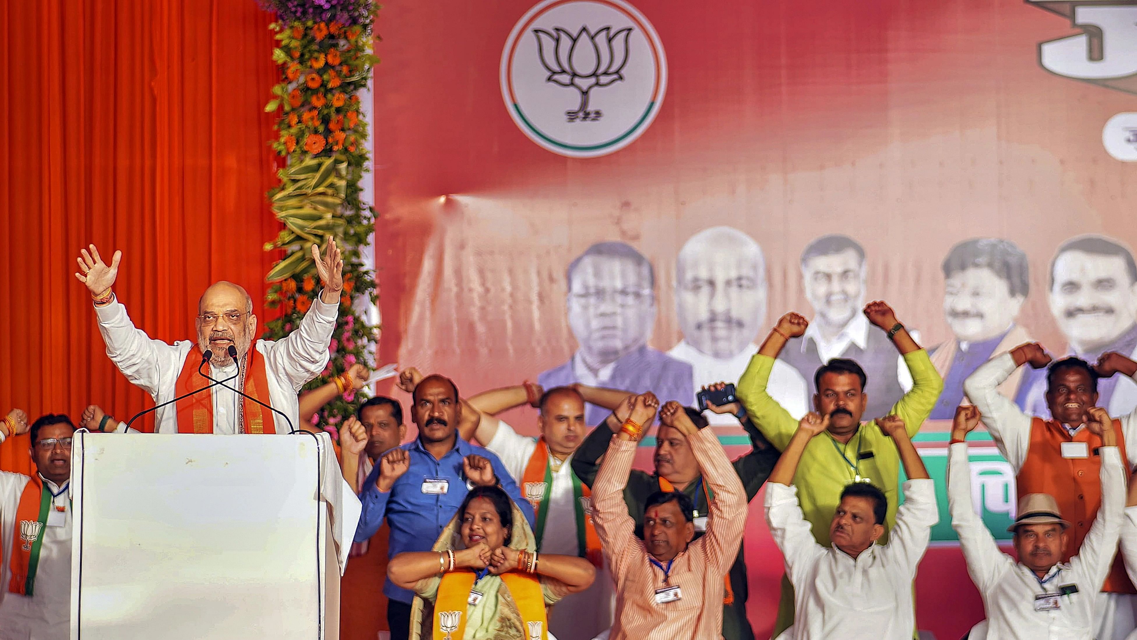 <div class="paragraphs"><p>Union Home Minister Amit Shah speaks during a public meeting ahead of Madhya Pradesh Assembly elections, at Junnardeo in Chhindwara district.</p></div>