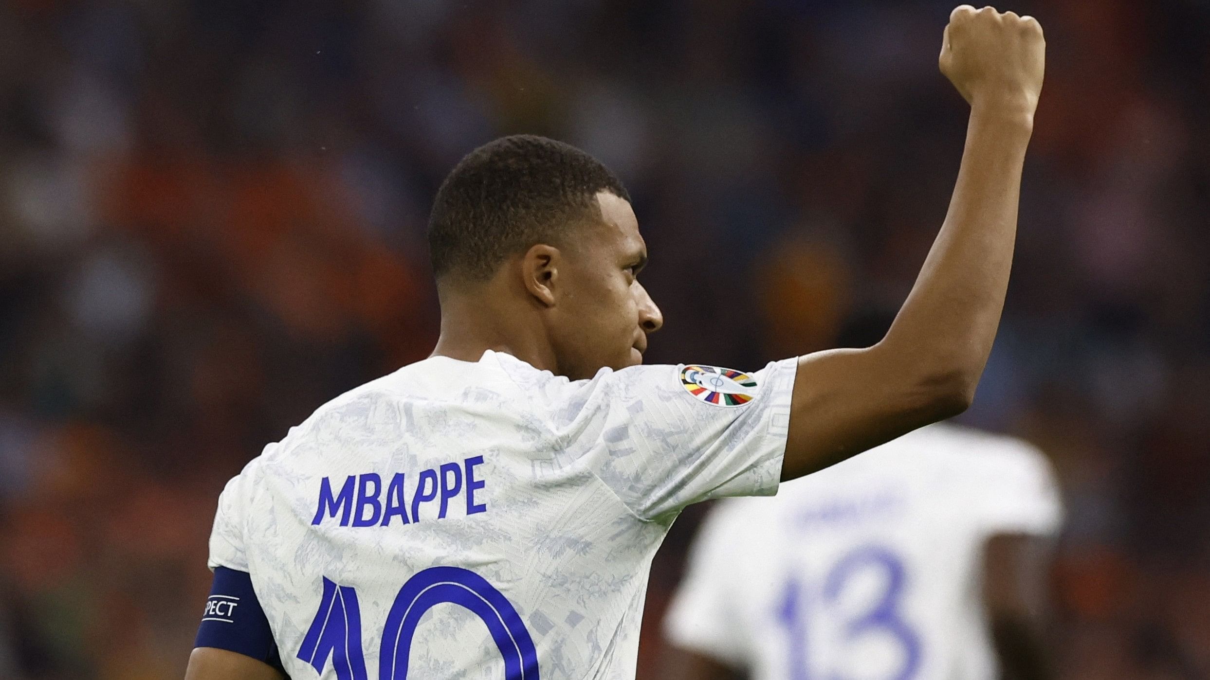 <div class="paragraphs"><p>France's Kylian Mbappe celebrates scoring their first goal</p></div>